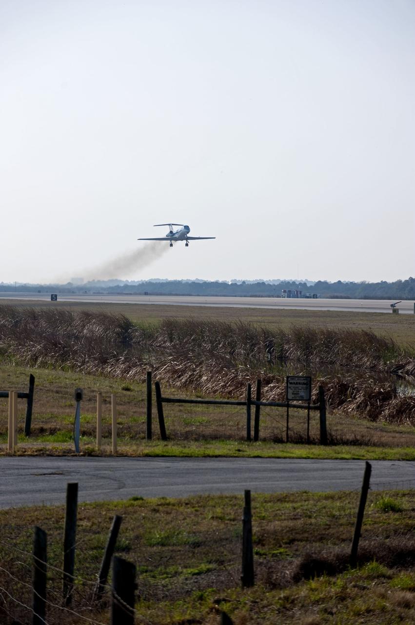 CAPE CANAVERAL, Fla. -- A Shuttle Training Aircraft (STA) performs touch-and-go landings over the Shuttle Landing Facility runway at NASA's Kennedy Space Center in Florida. STS-133 Commander Steve Lindsey and Pilot Eric Boe are flying two Gulfstream II business jets that are modified to mimic the shuttle's handling during the final phase of landing. These practice landings are part of standard training before space shuttle Discovery's launch to the International Space Station.        Scheduled to lift off Feb. 24 at 4:50 p.m. EST, Discovery and its six-member crew will deliver the Permanent Multipurpose Module, packed with supplies and critical spare parts, as well as Robonaut 2, the dexterous humanoid astronaut helper, to the orbiting outpost. For more information on the STS-133 mission, visit www.nasa.gov/mission_pages/shuttle/shuttlemissions/sts133/.  Photo credit: NASA/Kim Shiflett