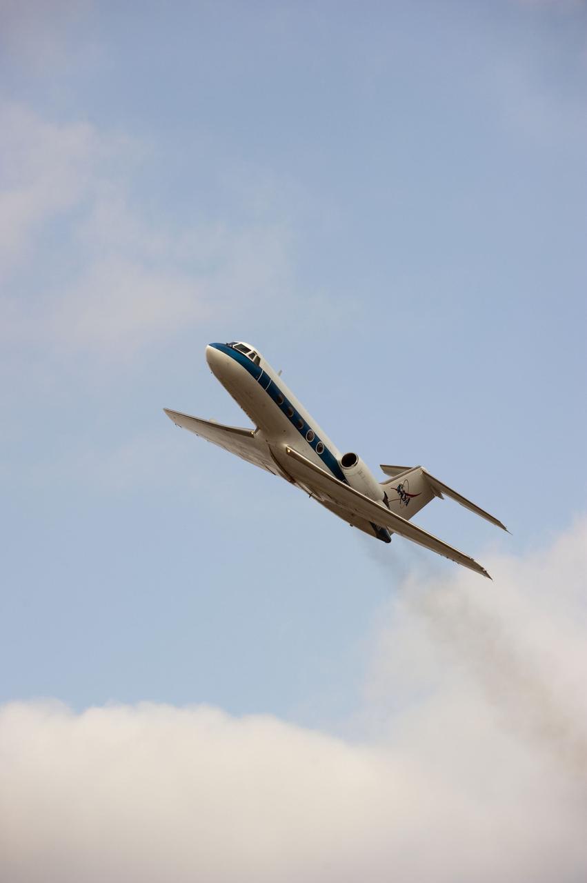 CAPE CANAVERAL, Fla. -- A Shuttle Training Aircraft (STA) performs touch-and-go landings over the Shuttle Landing Facility runway at NASA's Kennedy Space Center in Florida. STS-133 Commander Steve Lindsey and Pilot Eric Boe are flying two Gulfstream II business jets that are modified to mimic the shuttle's handling during the final phase of landing. These practice landings are part of standard training before space shuttle Discovery's launch to the International Space Station.        Scheduled to lift off Feb. 24 at 4:50 p.m. EST, Discovery and its six-member crew will deliver the Permanent Multipurpose Module, packed with supplies and critical spare parts, as well as Robonaut 2, the dexterous humanoid astronaut helper, to the orbiting outpost. For more information on the STS-133 mission, visit www.nasa.gov/mission_pages/shuttle/shuttlemissions/sts133/.  Photo credit: NASA/Kim Shiflett