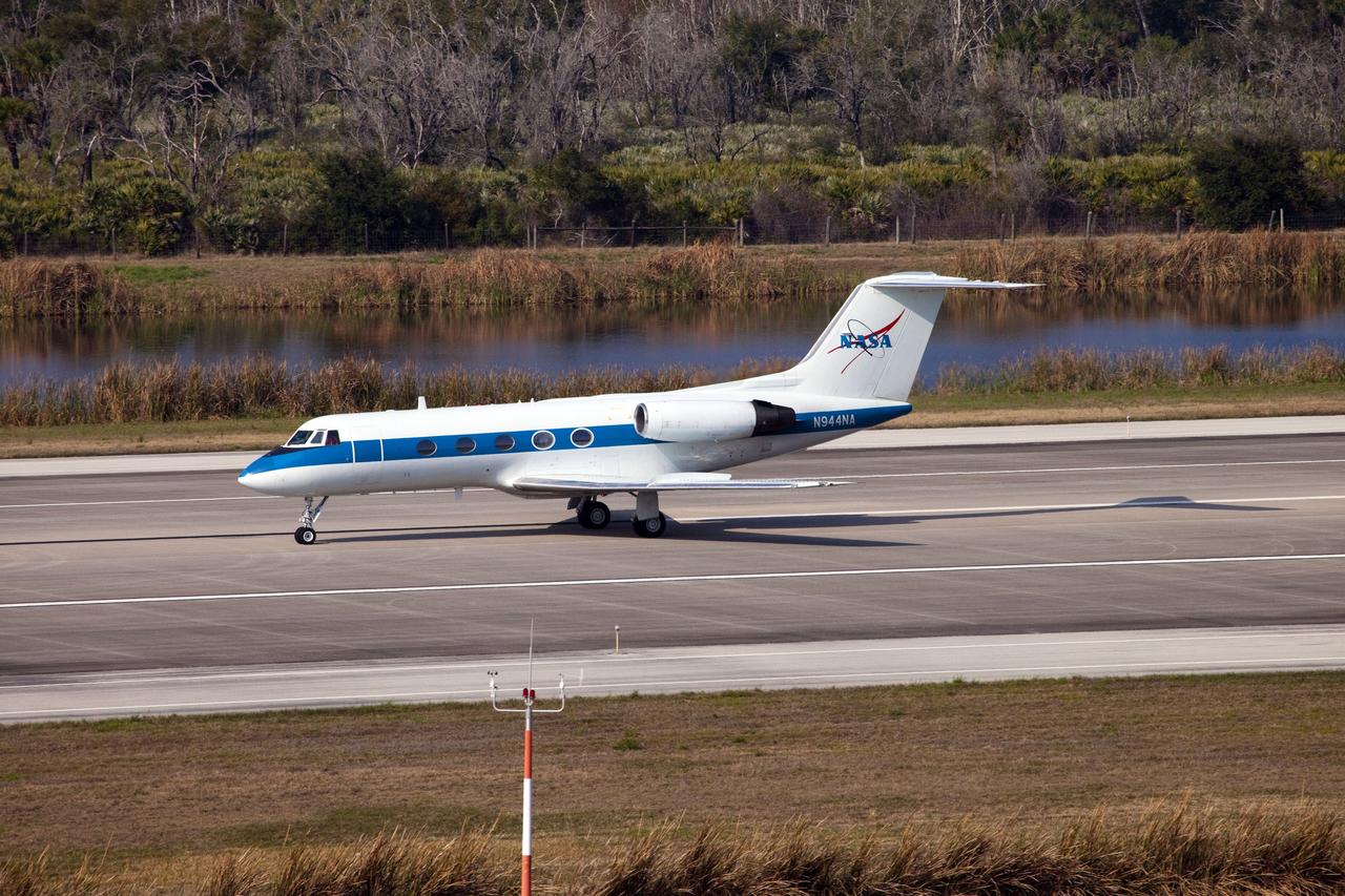 CAPE CANAVERAL, Fla. -- This image was taken from the Shuttle Landing Facility's air traffic control tower at NASA's Kennedy Space Center in Florida and provides a birds-eye view of STS-133 Commander Steve Lindsey performing touch-and-go landings aboard one of two Shuttle Training Aircraft (STA).            STAs are Gulfstream II business jets that are modified to mimic the shuttle's handling during the final phase of landing. Practice landings are part of standard training before space shuttle Discovery's launch to the International Space Station.   Scheduled to lift off Feb. 24 at 4:50 p.m. EST, Discovery and its six-member crew will deliver the Permanent Multipurpose Module, packed with supplies and critical spare parts, as well as Robonaut 2, the dexterous humanoid astronaut helper, to the orbiting outpost. For more information on the STS-133 mission, visit www.nasa.gov/mission_pages/shuttle/shuttlemissions/sts133/. Photo credit: NASA/Ben Smegelsky