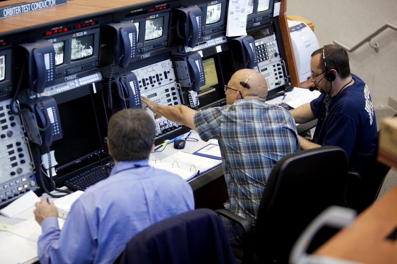 CAPE CANAVERAL, Fla. -- In Firing Room-4 in the Launch Control Center at NASA's Kennedy Space Center in Florida, launch controllers took their posts at about 2:30 p.m. EST for space shuttle Discovery's STS-133 mission to the International Space Station. The countdown clock began ticking backward from the T-43 hour mark at 3 p.m. Scheduled to lift off Feb. 24 at 4:50 p.m. EST, Discovery and its six-member crew will deliver the Permanent Multipurpose Module, packed with supplies and critical spare parts, as well as Robonaut 2, the dexterous humanoid astronaut helper, to the orbiting outpost. For more information on the STS-133 mission, visit www.nasa.gov/mission_pages/shuttle/shuttlemissions/sts133/. Photo credit: NASA/Frank Michaux