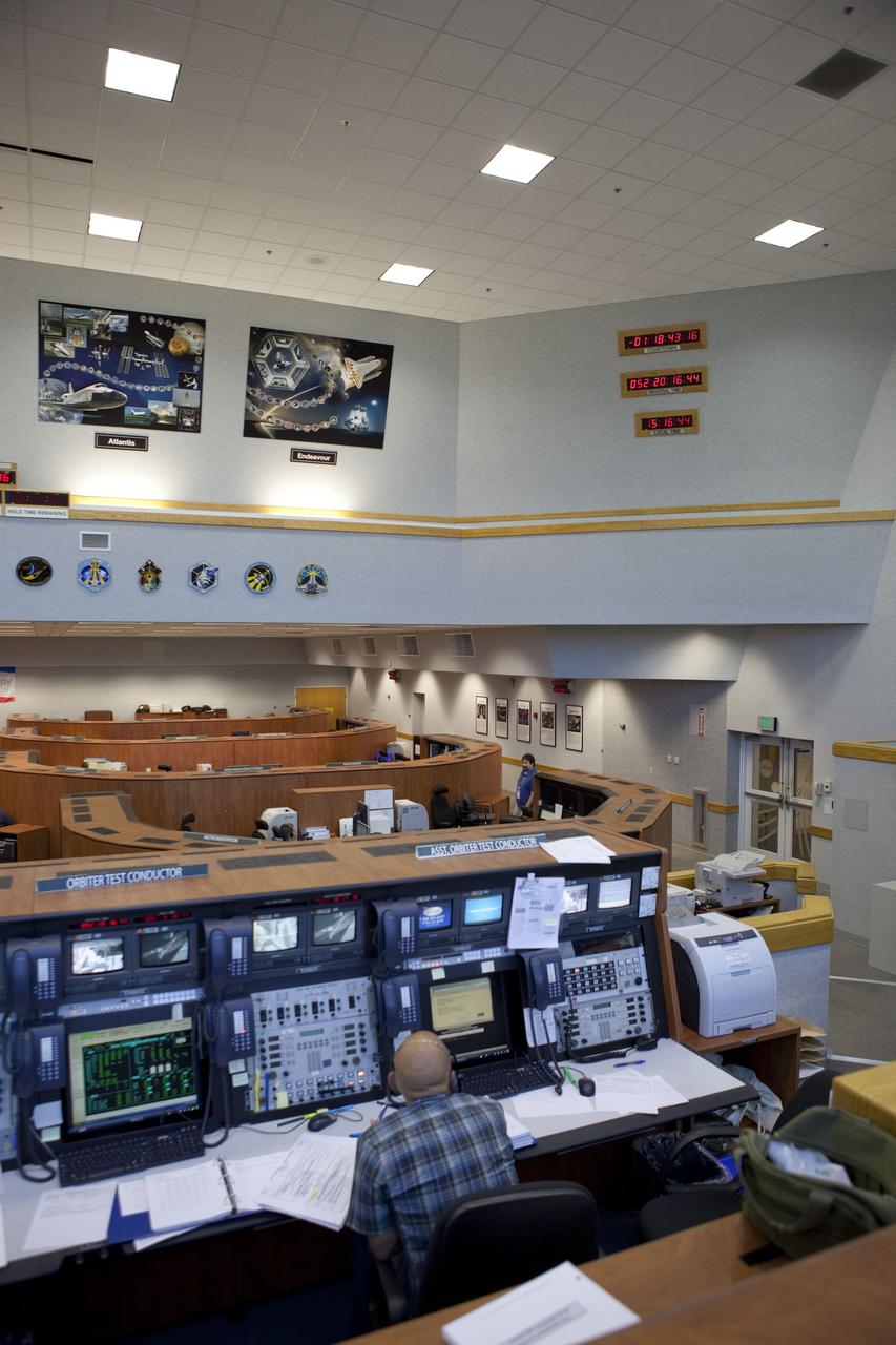 CAPE CANAVERAL, Fla. -- In Firing Room-4 in the Launch Control Center at NASA's Kennedy Space Center in Florida, launch controllers took their posts at about 2:30 p.m. EST for space shuttle Discovery's STS-133 mission to the International Space Station. The countdown clock began ticking backward from the T-43 hour mark at 3 p.m. Scheduled to lift off Feb. 24 at 4:50 p.m. EST, Discovery and its six-member crew will deliver the Permanent Multipurpose Module, packed with supplies and critical spare parts, as well as Robonaut 2, the dexterous humanoid astronaut helper, to the orbiting outpost. For more information on the STS-133 mission, visit www.nasa.gov/mission_pages/shuttle/shuttlemissions/sts133/. Photo credit: NASA/Frank Michaux
