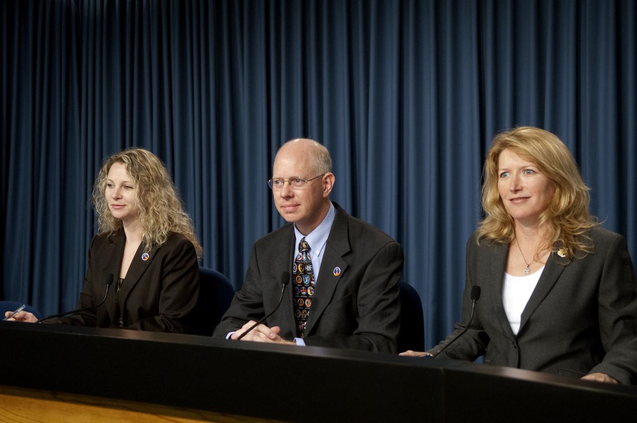 CAPE CANAVERAL, Fla. -- NASA Public Affairs Officer Candrea Thomas, NASA Test Director Steve Payne and Shuttle Launch Weather Officer Kathy Winters talk to media about the progression of the countdown to launch space shuttle Discovery on the STS-133 mission to the International Space Station and the launch-day weather forecast.          Scheduled to lift off Feb. 24 at 4:50 p.m. EST, Discovery and its six-member crew will deliver the Permanent Multipurpose Module, packed with supplies and critical spare parts, as well as Robonaut 2, the dexterous humanoid astronaut helper, to the orbiting outpost. For more information on the STS-133 mission, visit www.nasa.gov/mission_pages/shuttle/shuttlemissions/sts133/.  Photo credit: NASA/Jim Grossmann
