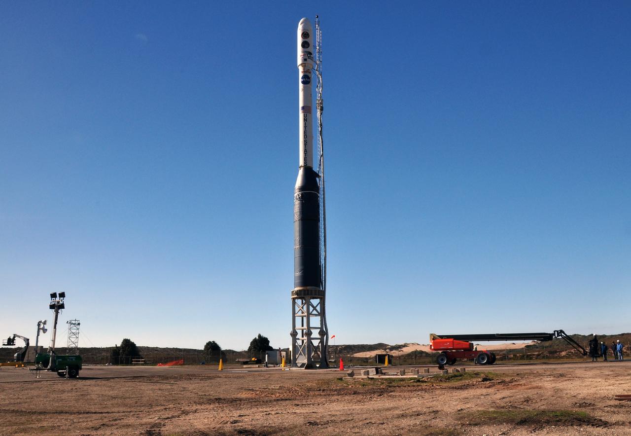 VANDENBERG AIR FORCE BASE, Calif. -- On Space Launch Complex 576-E at Vandenberg Air Force Base in California, the Taurus XL rocket is in its launch configuration. The upper stack, consisting of Stages 1, 2 and 3, as well as the encapsulated Glory spacecraft, is attached to an interstage and Stage 0 at the launch pad. The umbilical tower attached to the upper stack will fall away from the spacecraft during liftoff.            The Orbital Sciences Taurus XL rocket will launch Glory into low Earth orbit. Once Glory reaches orbit, it will collect data on the properties of aerosols and black carbon. It also will help scientists understand how the sun's irradiance affects Earth's climate. Launch is scheduled for 5:09 a.m. EST Feb. 23. For information, visit www.nasa.gov/glory. Photo credit: NASA/Randy Beaudoin, VAFB