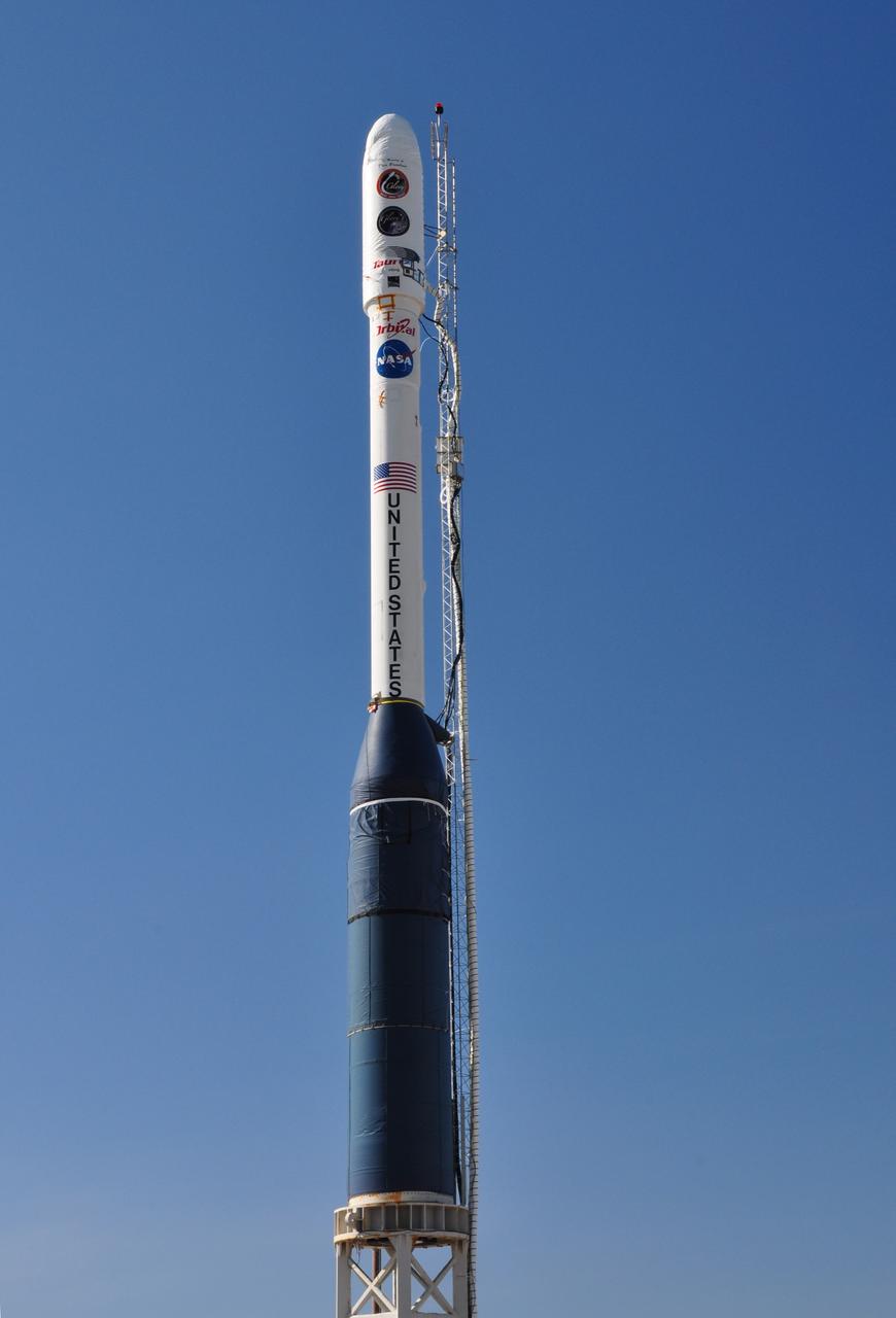 VANDENBERG AIR FORCE BASE, Calif. -- On Space Launch Complex 576-E at Vandenberg Air Force Base in California, the Taurus XL rocket is in its launch configuration. The upper stack, consisting of Stages 1, 2 and 3, as well as the encapsulated Glory spacecraft, is attached to an interstage and Stage 0 at the launch pad. The umbilical tower attached to the upper stack will fall away from the spacecraft during liftoff.            The Orbital Sciences Taurus XL rocket will launch Glory into low Earth orbit. Once Glory reaches orbit, it will collect data on the properties of aerosols and black carbon. It also will help scientists understand how the sun's irradiance affects Earth's climate. Launch is scheduled for 5:09 a.m. EST Feb. 23. For information, visit www.nasa.gov/glory. Photo credit: NASA/Randy Beaudoin, VAFB