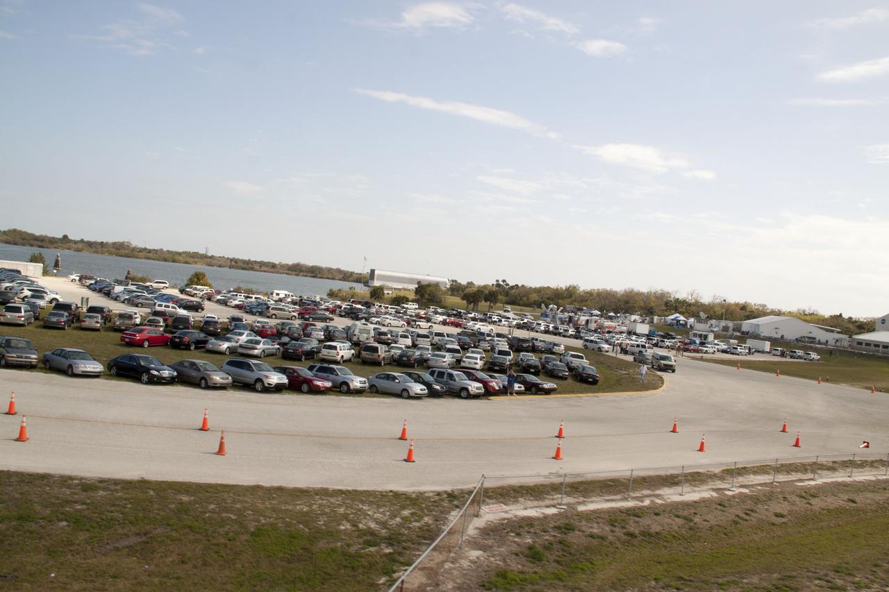 CAPE CANAVERAL, Fla. -- At NASA's Kennedy Space Center in Florida, thousands of workers, their friends and families, and members of the news media are near the Launch Complex 39 Press Site to watch space shuttle Discovery embark on its final scheduled mission.       Liftoff is set for 4:50 p.m. EST on Feb. 24. Discovery and its six-member STS-133 crew will deliver the Permanent Multipurpose Module, packed with supplies and critical spare parts, as well as Robonaut 2, the dexterous humanoid astronaut helper, to the International Space Station. Discovery, which will fly its 39th mission, is scheduled to be retired following STS-133. This will be the 133rd Space Shuttle Program mission and the 35th shuttle voyage to the space station. For more information on the STS-133 mission, visit www.nasa.gov/mission_pages/shuttle/shuttlemissions/sts133/. Photo credit: NASA/Jack Pfaller