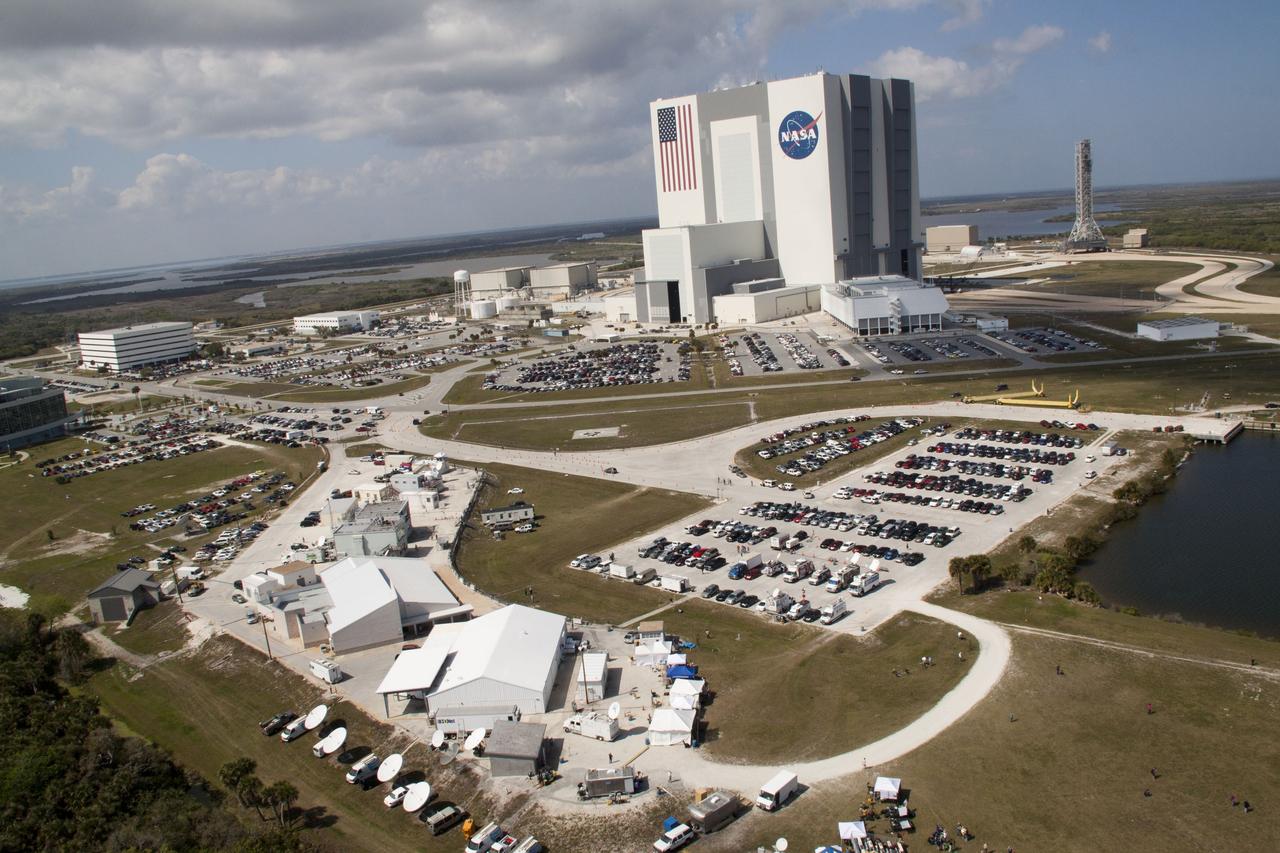 CAPE CANAVERAL, Fla. -- At NASA's Kennedy Space Center in Florida, thousands of workers, their friends and families, and members of the news media are near the Launch Complex 39 Press Site to watch space shuttle Discovery embark on its final scheduled mission.       Liftoff is set for 4:50 p.m. EST on Feb. 24. Discovery and its six-member STS-133 crew will deliver the Permanent Multipurpose Module, packed with supplies and critical spare parts, as well as Robonaut 2, the dexterous humanoid astronaut helper, to the International Space Station. Discovery, which will fly its 39th mission, is scheduled to be retired following STS-133. This will be the 133rd Space Shuttle Program mission and the 35th shuttle voyage to the space station. For more information on the STS-133 mission, visit www.nasa.gov/mission_pages/shuttle/shuttlemissions/sts133/. Photo credit: NASA/Jack Pfaller
