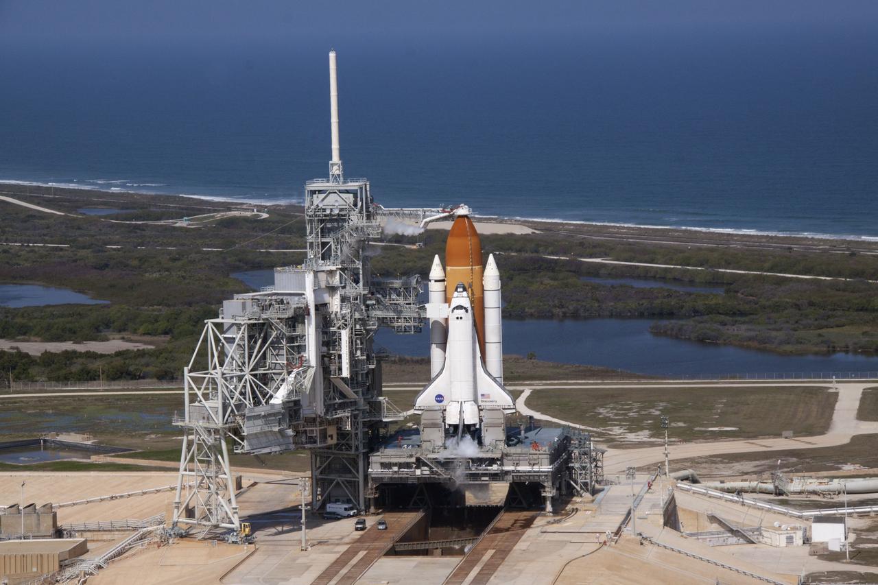 CAPE CANAVERAL, Fla. -- On Launch Pad 39A at NASA's Kennedy Space Center in Florida, space shuttle Discovery awaits the liftoff of its final scheduled mission on what is shaping up to be a picturesque day.    Liftoff is set for 4:50 p.m. EST on Feb. 24. Discovery and its six-member STS-133 crew will deliver the Permanent Multipurpose Module, packed with supplies and critical spare parts, as well as Robonaut 2, the dexterous humanoid astronaut helper, to the International Space Station. Discovery, which will fly its 39th mission, is scheduled to be retired following STS-133. This will be the 133rd Space Shuttle Program mission and the 35th shuttle voyage to the space station. For more information on the STS-133 mission, visit www.nasa.gov/mission_pages/shuttle/shuttlemissions/sts133/. Photo credit: NASA/Jack Pfaller