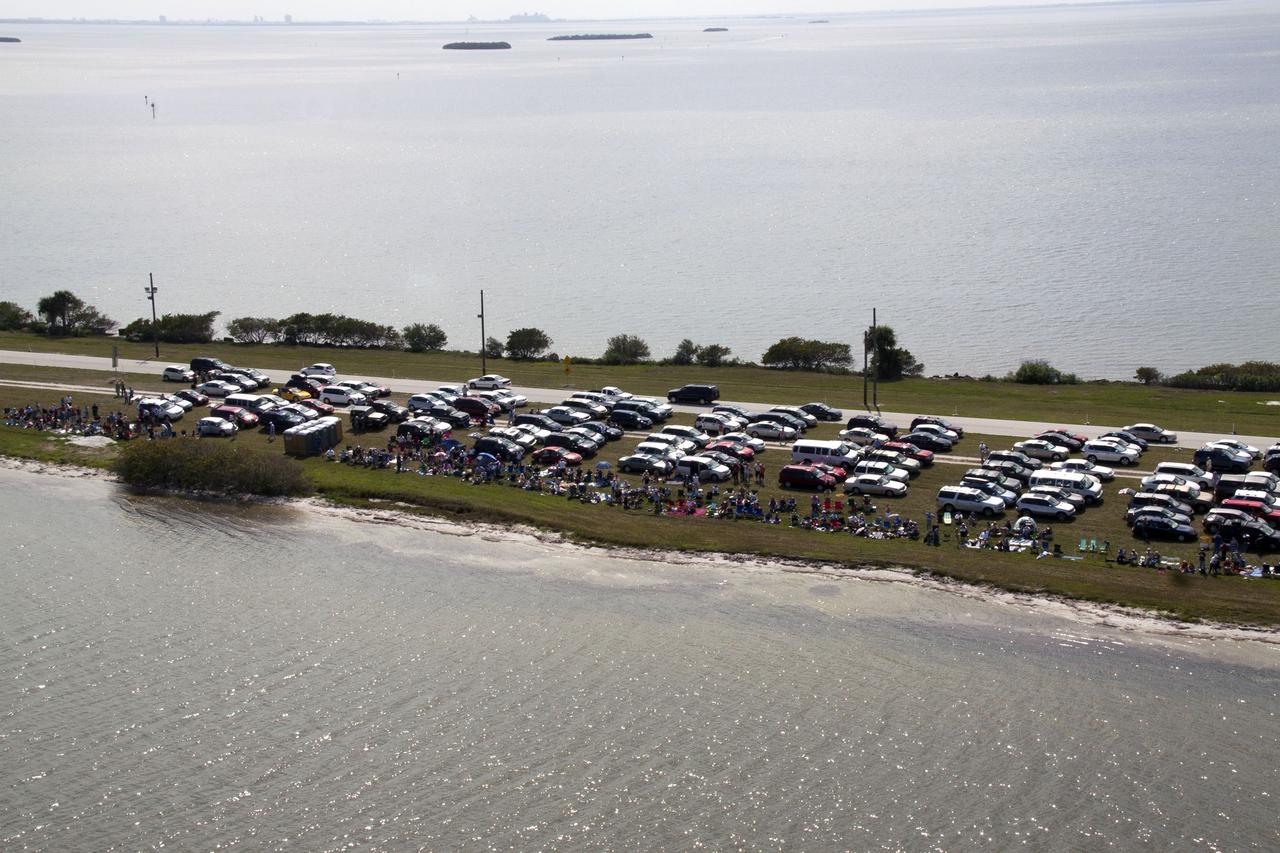 CAPE CANAVERAL, Fla. -- Crowds fill the areas along the NASA Causeway at NASA's Kennedy Space Center to watch space shuttle Discovery lift off on its final scheduled mission from Launch Pad 39A.        Liftoff is set for 4:50 p.m. EST on Feb. 24. Discovery and its six-member STS-133 crew will deliver the Permanent Multipurpose Module, packed with supplies and critical spare parts, as well as Robonaut 2, the dexterous humanoid astronaut helper, to the International Space Station. Discovery, which will fly its 39th mission, is scheduled to be retired following STS-133. This will be the 133rd Space Shuttle Program mission and the 35th shuttle voyage to the space station. For more information on the STS-133 mission, visit www.nasa.gov/mission_pages/shuttle/shuttlemissions/sts133/. Photo credit: NASA/Jack Pfaller