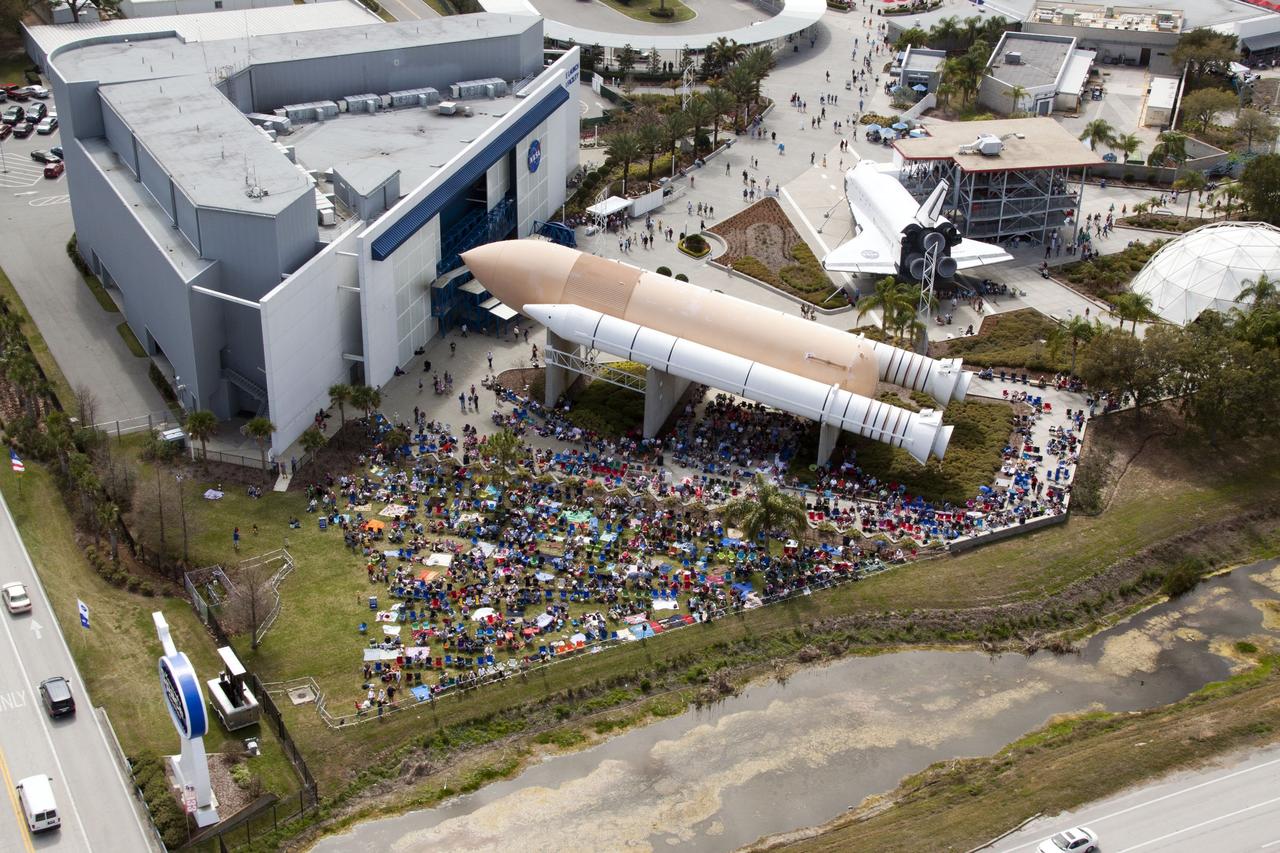 CAPE CANAVERAL, Fla. -- Swarms of people are at the Kennedy Space Center Visitor Complex in Florida to watch space shuttle Discovery lift off on its final scheduled mission from Launch Pad 39A.      Liftoff is set for 4:50 p.m. EST on Feb. 24. Discovery and its six-member STS-133 crew will deliver the Permanent Multipurpose Module, packed with supplies and critical spare parts, as well as Robonaut 2, the dexterous humanoid astronaut helper, to the International Space Station. Discovery, which will fly its 39th mission, is scheduled to be retired following STS-133. This will be the 133rd Space Shuttle Program mission and the 35th shuttle voyage to the space station. For more information on the STS-133 mission, visit www.nasa.gov/mission_pages/shuttle/shuttlemissions/sts133/. Photo credit: NASA/Jack Pfaller