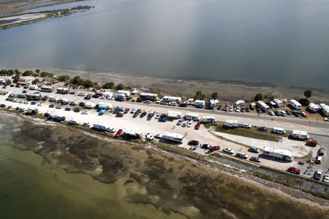 CAPE CANAVERAL, Fla. -- Folks from across the country camped out in communities surrounding NASA's Kennedy Space Center in Florida to witness space shuttle Discovery make history by lifting off on its final scheduled mission from Launch Pad 39A. Seen here, is State Road 406, also known as the A. Max Brewer Causeway, in Titusville, Fla. Liftoff is set for 4:50 p.m. EST on Feb. 24. Discovery and its six-member STS-133 crew will deliver the Permanent Multipurpose Module, packed with supplies and critical spare parts, as well as Robonaut 2, the dexterous humanoid astronaut helper, to the International Space Station. Discovery, which will fly its 39th mission, is scheduled to be retired following STS-133. This will be the 133rd Space Shuttle Program mission and the 35th shuttle voyage to the space station. For more information on the STS-133 mission, visit www.nasa.gov/mission_pages/shuttle/shuttlemissions/sts133/. Photo credit: NASA/Jack Pfaller