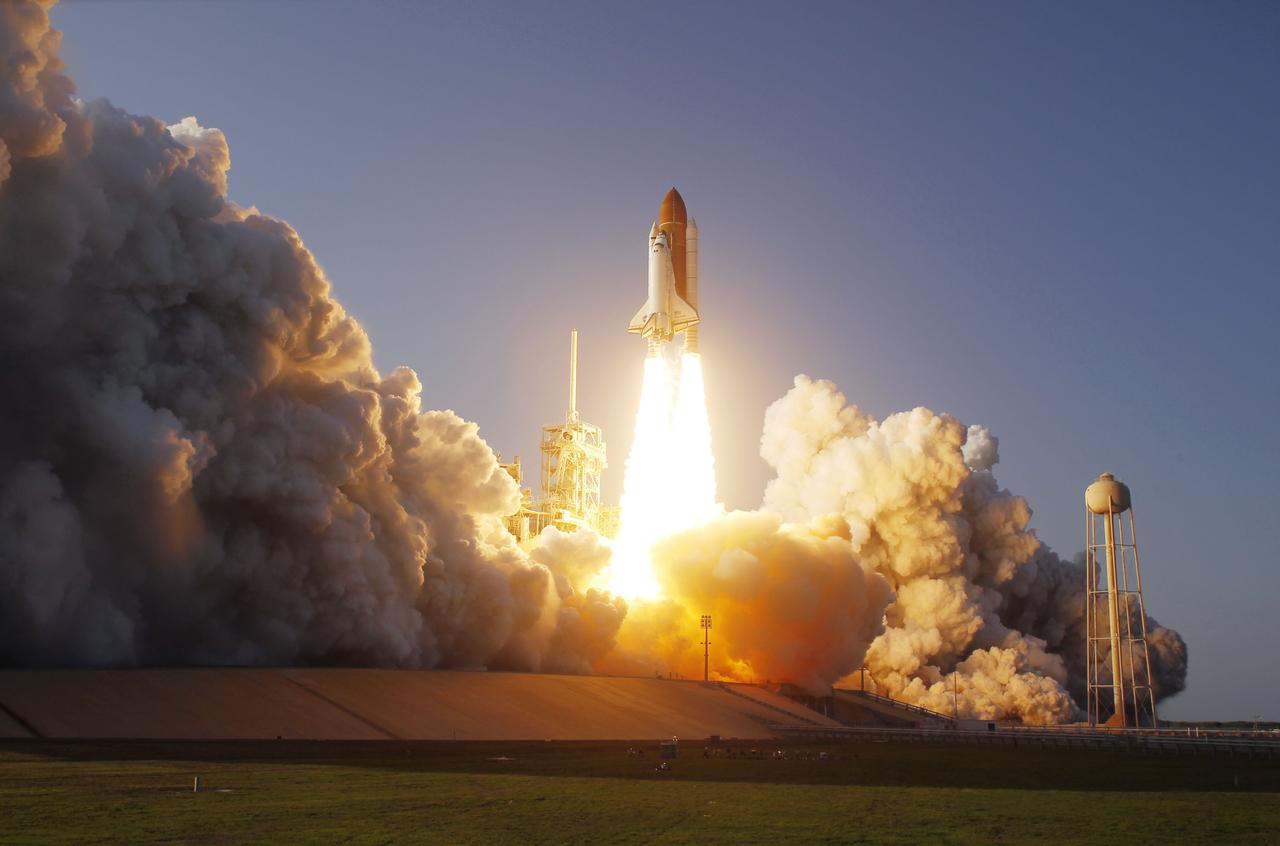 CAPE CANAVERAL, Fla. -- Rising on twin columns of fire and creating rolling clouds of smoke and steam, space shuttle Discovery lifts off Launch Pad 39A at NASA's Kennedy Space Center in Florida on a picturesque, warm, late February afternoon. Launch of the STS-133 mission was at 4:53 p.m. EST on Feb. 24. Discovery and its six-member crew are on a mission to deliver the Permanent Multipurpose Module, packed with supplies and critical spare parts, as well as Robonaut 2, the dexterous humanoid astronaut helper, to the International Space Station. Discovery is making its 39th mission and is scheduled to be retired following STS-133. This is the 133rd Space Shuttle Program mission and the 35th shuttle voyage to the space station. For more information on the STS-133 mission, visit www.nasa.gov/mission_pages/shuttle/shuttlemissions/sts133/. Photo credit: NASA