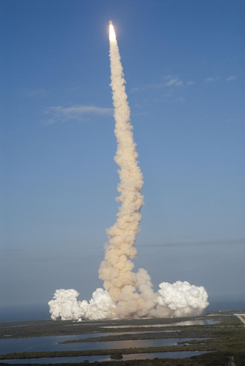 CAPE CANAVERAL, Fla. -- Taken from the roof of the Vehicle Assembly Building at NASA's Kennedy Space Center in Florida, space shuttle Discovery lifts off Launch Pad 39A atop twin columns of fire, creating rolling clouds of smoke and steam in its track. Launch of the STS-133 mission was at 4:53 p.m. EST on Feb. 24. Discovery and its six-member crew are on a mission to deliver the Permanent Multipurpose Module, packed with supplies and critical spare parts, as well as Robonaut 2, the dexterous humanoid astronaut helper, to the International Space Station. Discovery is making its 39th mission and is scheduled to be retired following STS-133. This is the 133rd Space Shuttle Program mission, the 35th shuttle voyage to the space station and Discovery's final mission. For more information on the STS-133 mission, visit www.nasa.gov/mission_pages/shuttle/shuttlemissions/sts133/. Photo credit: NASA/Jeff Marino
