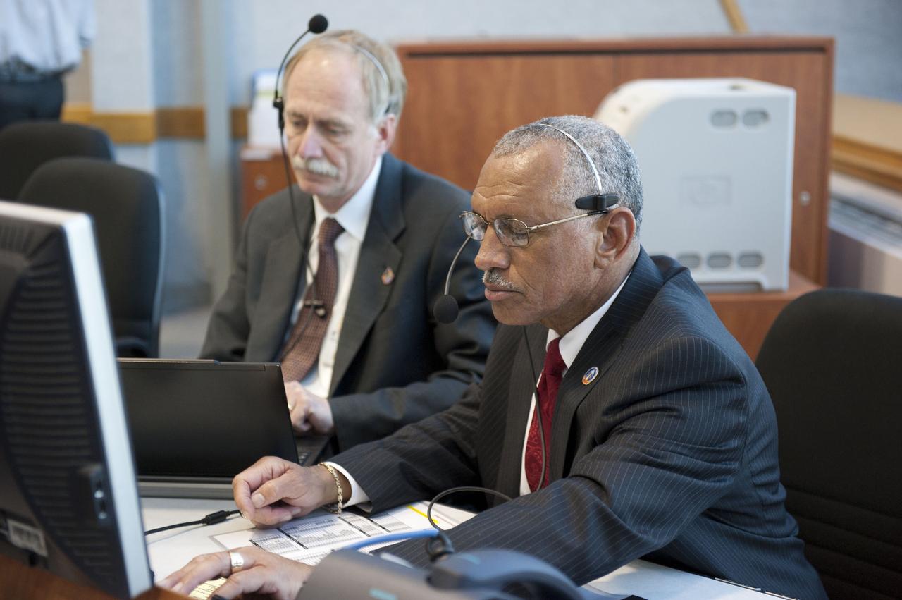 CAPE CANAVERAL, Fla. -- In Firing Room 4 of the Launch Control Center at NASA's Kennedy Space Center in Florida, Associate Administrator for Space Operations Bill Gerstenmaier and NASA Administrator Charlie Bolden monitor the countdown to launch of space shuttle Discovery on its STS-133 mission to the International Space Station.             Discovery and its six-member crew are on a mission to deliver the Permanent Multipurpose Module, packed with supplies and critical spare parts, as well as Robonaut 2, the dexterous humanoid astronaut helper, to the orbiting outpost. Discovery is making its 39th mission and is scheduled to be retired following STS-133. This is the 133rd Space Shuttle Program mission and the 35th shuttle voyage to the space station. For more information on the STS-133 mission, visit www.nasa.gov/mission_pages/shuttle/shuttlemissions/sts133/. Photo credit: NASA/Kim Shiflett