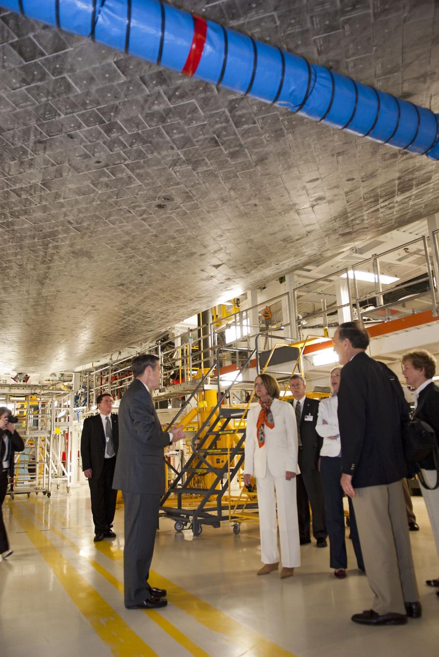 CAPE CANAVERAL, Fla. -- House Of Representatives Democratic Leader Nancy Pelosi, from California's 8th District, and other VIPs are at NASA's Kennedy Space Center in Florida to witness space shuttle Discovery make history as it lifts off on its final scheduled mission from Launch Pad 39A. While at the space center, they attended a presentation in the Operations Support Building II and toured Orbiter Processing Facilities 1 and 2 where shuttles Atlantis and Endeavour are being prepared for their final missions respectively.      Discovery and its six-member STS-133 crew will deliver the Permanent Multipurpose Module, packed with supplies and critical spare parts, as well as Robonaut 2, the dexterous humanoid astronaut helper, to the International Space Station. Discovery will make its 39th mission and is scheduled to be retired following STS-133. This will be the 133rd Space Shuttle Program mission and the 35th shuttle voyage to the space station. For more information on the STS-133 mission, visit www.nasa.gov/mission_pages/shuttle/shuttlemissions/sts133/.  Photo credit: NASA/Jim Grossmann