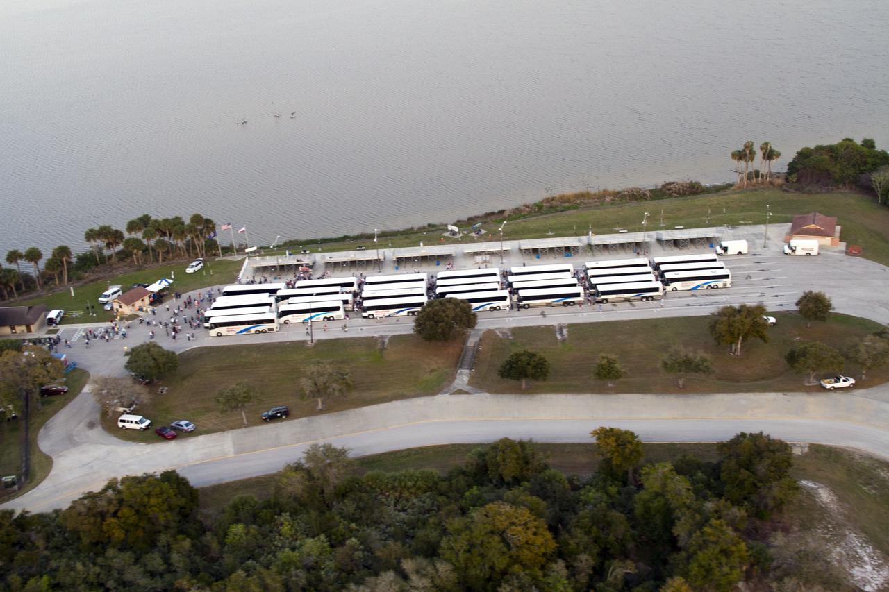 CAPE CANAVERAL, Fla. -- This image of the Apollo/Saturn V Center parking lot viewing area and surrounding roadway at NASA's Kennedy Space Center in Florida, was taken from a traffic survey helicopter after the successful launch of space shuttle Discovery at 4:53 p.m. EST on its final flight to the International Space Station.      Discovery's six-member crew will deliver the Permanent Multipurpose Module, packed with supplies and critical spare parts, as well as Robonaut 2, the dexterous humanoid astronaut helper, to the orbiting outpost. Discovery is flying on its 39th and final mission and is scheduled to be retired following STS-133. This is the 133rd Space Shuttle Program mission and the 35th shuttle voyage to the space station. For more information on the STS-133 mission, visit www.nasa.gov/mission_pages/shuttle/shuttlemissions/sts133/. Photo credit: NASA/Jack Pfaller