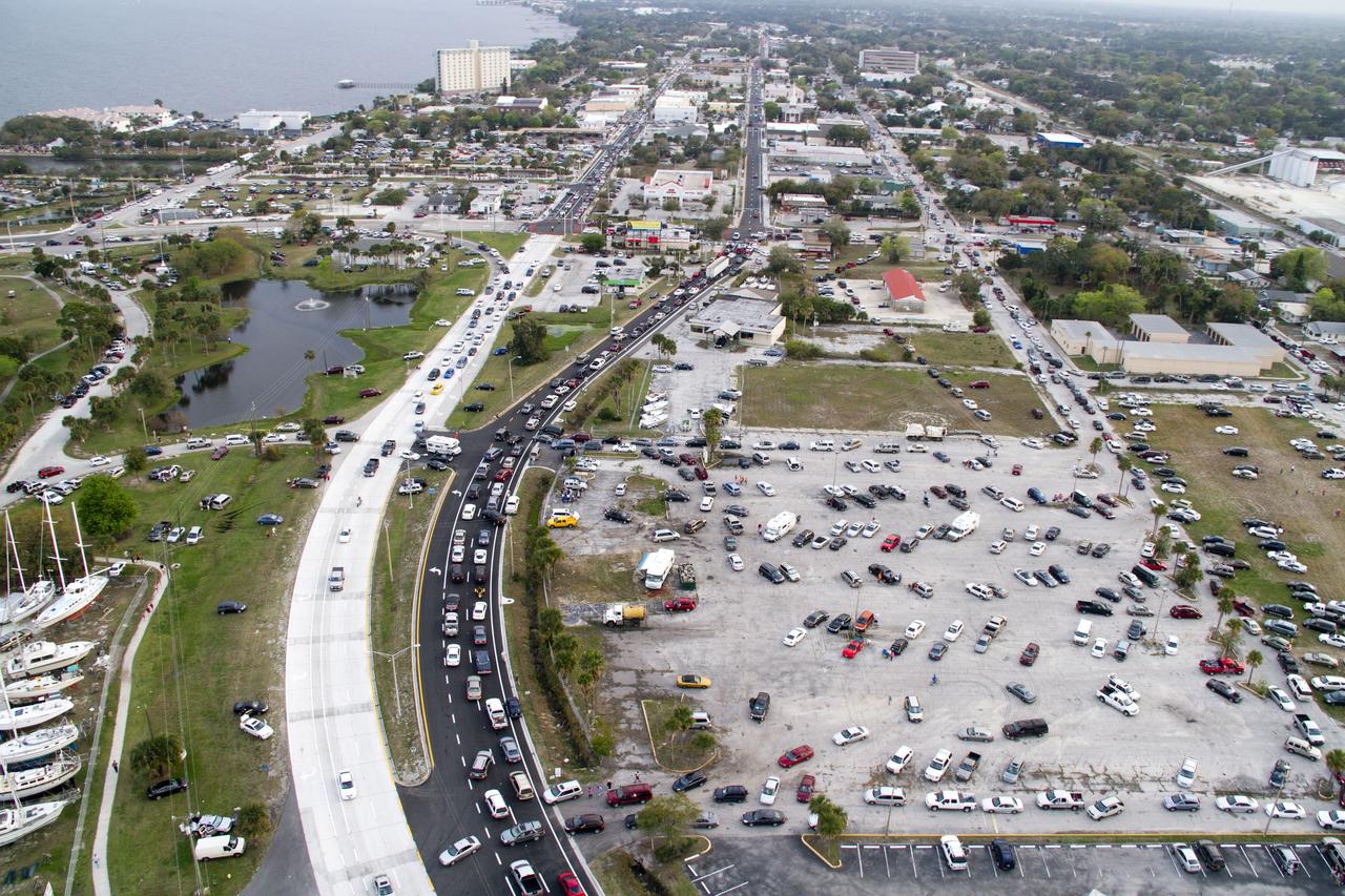 CAPE CANAVERAL, Fla. -- This image of State Road 406, also known as the A. Max Brewer Causeway and surrounding roadways in Titusville, Florida, was taken from a traffic survey helicopter after the successful launch of space shuttle Discovery at 4:53 p.m. EST on its final flight to the International Space Station. Discovery's six-member crew will deliver the Permanent Multipurpose Module, packed with supplies and critical spare parts, as well as Robonaut 2, the dexterous humanoid astronaut helper, to the orbiting outpost. Discovery is flying on its 39th and final mission and is scheduled to be retired following STS-133. This is the 133rd Space Shuttle Program mission and the 35th shuttle voyage to the space station. For more information on the STS-133 mission, visit www.nasa.gov/mission_pages/shuttle/shuttlemissions/sts133/. Photo credit: NASA/Jack Pfaller