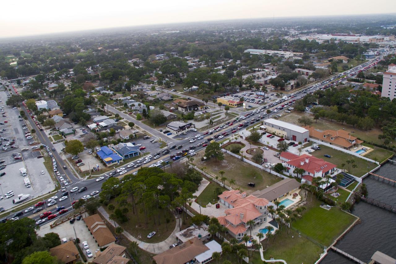 CAPE CANAVERAL, Fla. -- This image of U. S. Highway 1 and surrounding roadways in Titusville, Florida, was taken from a traffic survey helicopter after the successful launch of space shuttle Discovery at 4:53 p.m. EST on its final flight to the International Space Station.          Discovery's six-member crew will deliver the Permanent Multipurpose Module, packed with supplies and critical spare parts, as well as Robonaut 2, the dexterous humanoid astronaut helper, to the orbiting outpost. Discovery is flying on its 39th and final mission and is scheduled to be retired following STS-133. This is the 133rd Space Shuttle Program mission and the 35th shuttle voyage to the space station. For more information on the STS-133 mission, visit www.nasa.gov/mission_pages/shuttle/shuttlemissions/sts133/. Photo credit: NASA/Jack Pfaller