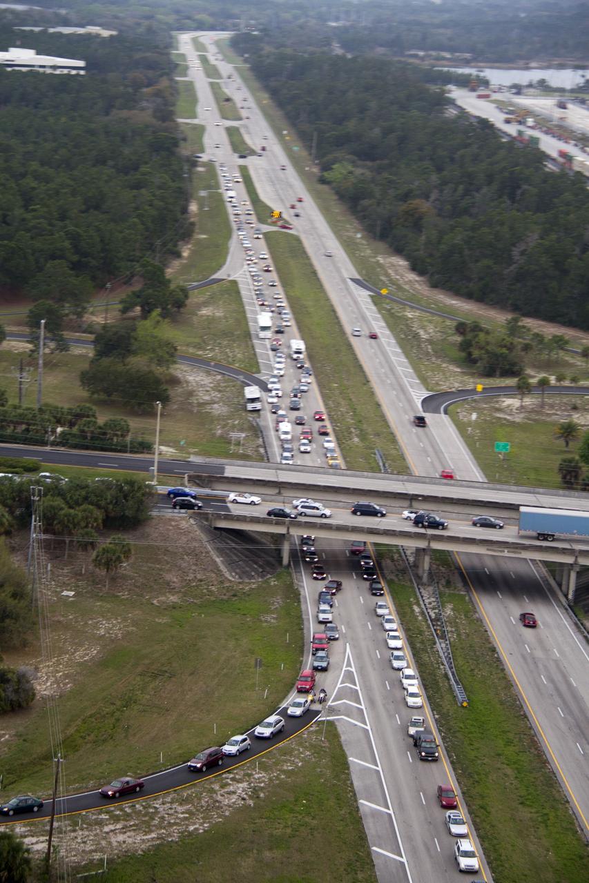 CAPE CANAVERAL, Fla. -- This image of U. S. Highway 1 and surrounding roadways in Titusville, Florida, was taken from a traffic survey helicopter after the successful launch of space shuttle Discovery at 4:53 p.m. EST on its final flight to the International Space Station.          Discovery's six-member crew will deliver the Permanent Multipurpose Module, packed with supplies and critical spare parts, as well as Robonaut 2, the dexterous humanoid astronaut helper, to the orbiting outpost. Discovery is flying on its 39th and final mission and is scheduled to be retired following STS-133. This is the 133rd Space Shuttle Program mission and the 35th shuttle voyage to the space station. For more information on the STS-133 mission, visit www.nasa.gov/mission_pages/shuttle/shuttlemissions/sts133/. Photo credit: NASA/Jack Pfaller