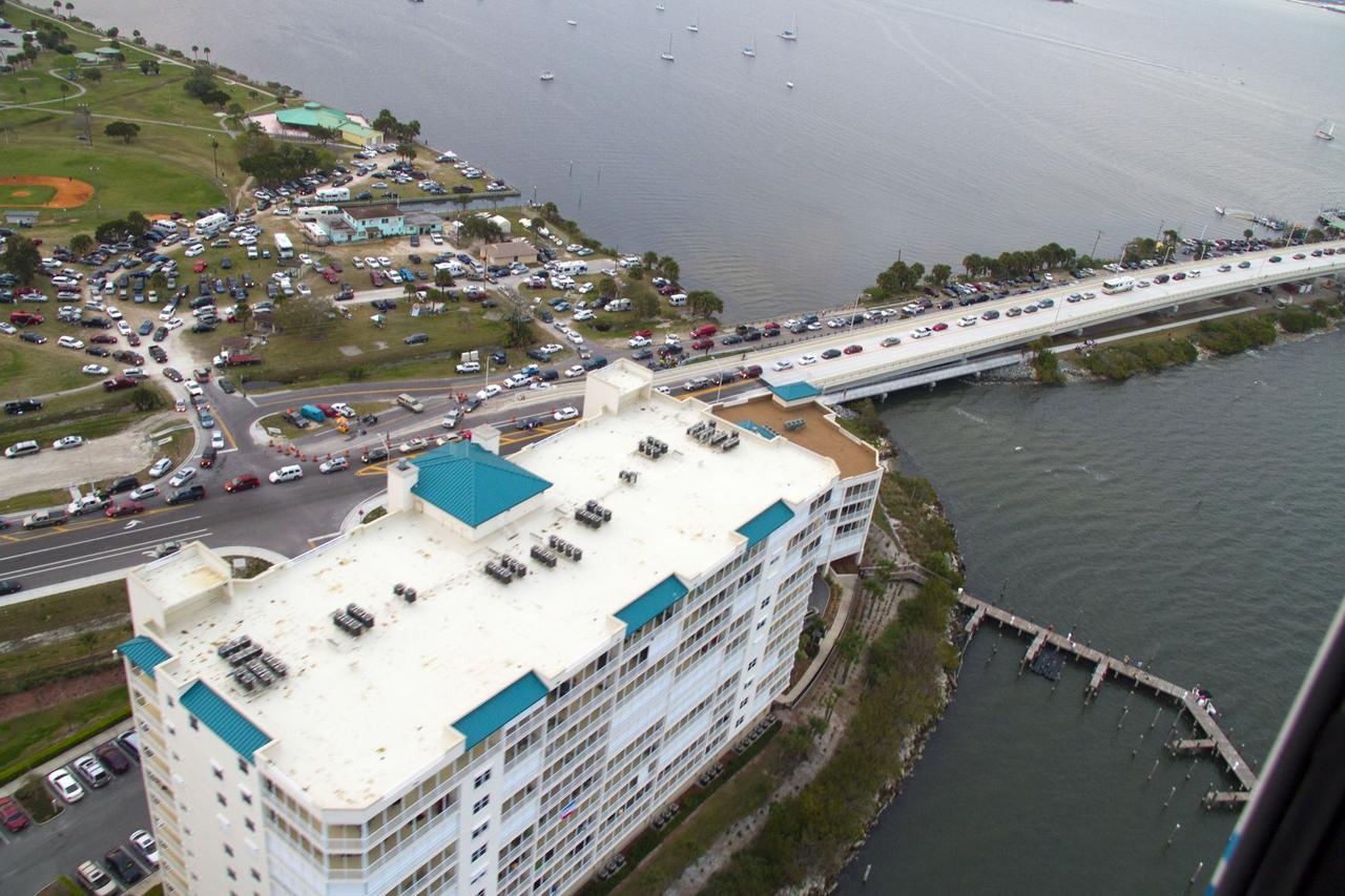 CAPE CANAVERAL, Fla. -- This image of State Road 406, also known as the A. Max Brewer Causeway in Titusville, Florida, was taken from a traffic survey helicopter after the successful launch of space shuttle Discovery at 4:53 p.m. EST on its final flight to the International Space Station. Discovery's six-member crew will deliver the Permanent Multipurpose Module, packed with supplies and critical spare parts, as well as Robonaut 2, the dexterous humanoid astronaut helper, to the orbiting outpost. Discovery is flying on its 39th and final mission and is scheduled to be retired following STS-133. This is the 133rd Space Shuttle Program mission and the 35th shuttle voyage to the space station. For more information on the STS-133 mission, visit www.nasa.gov/mission_pages/shuttle/shuttlemissions/sts133/. Photo credit: NASA/Jack Pfaller