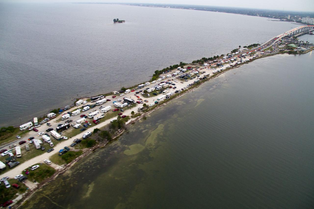 CAPE CANAVERAL, Fla. -- This image of State Road 406, also known as the A. Max Brewer Causeway in Titusville, Florida, was taken from a traffic survey helicopter after the successful launch of space shuttle Discovery at 4:53 p.m. EST on its final flight to the International Space Station.Discovery's six-member crew will deliver the Permanent Multipurpose Module, packed with supplies and critical spare parts, as well as Robonaut 2, the dexterous humanoid astronaut helper, to the orbiting outpost. Discovery is flying on its 39th and final mission and is scheduled to be retired following STS-133. This is the 133rd Space Shuttle Program mission and the 35th shuttle voyage to the space station. For more information on the STS-133 mission, visit www.nasa.gov/mission_pages/shuttle/shuttlemissions/sts133/. Photo credit: NASA/Jack Pfaller