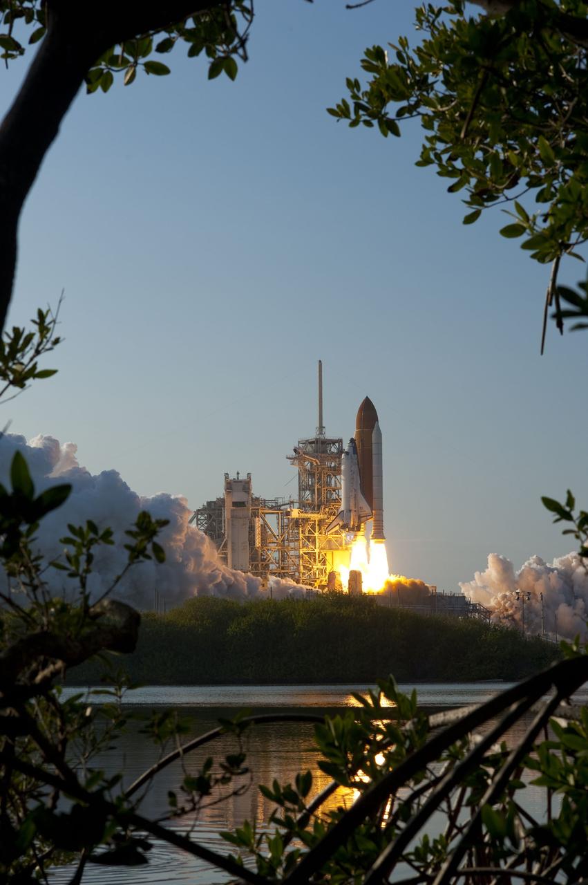 CAPE CANAVERAL, Fla. -- Space shuttle Discovery ignites for liftoff off Launch Pad 39A at NASA's Kennedy Space Center in Florida beginning its final flight to the International Space Station on the STS-133 mission. Launch was at 4:53 p.m. EST.            Discovery and its six-member crew will deliver the Permanent Multipurpose Module, packed with supplies and critical spare parts, as well as Robonaut 2, the dexterous humanoid astronaut helper, to the orbiting outpost. Discovery is flying on its 39th mission and is scheduled to be retired following STS-133. This is the 133rd Space Shuttle Program mission and the 35th shuttle voyage to the space station. For more information on the STS-133 mission, visit www.nasa.gov/mission_pages/shuttle/shuttlemissions/sts133/. Photo credit: NASA/Sandra Joseph and Kevin O'Connell