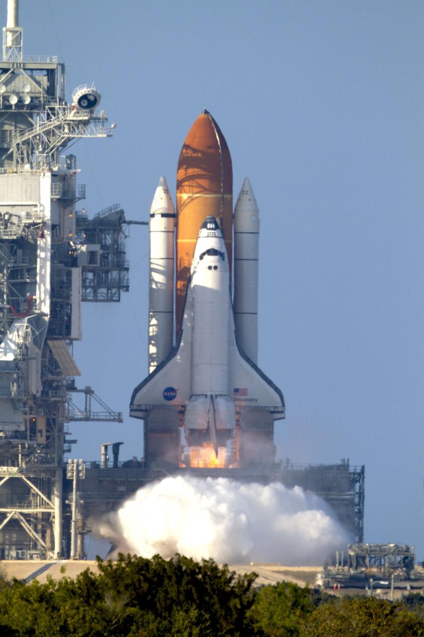 CAPE CANAVERAL, Fla. -- Space shuttle Discovery's boosters ignite and main engines start beginning its final scheduled mission, STS-133, to the International Space Station. Liftoff from launch Pad 39A at NASA's Kennedy Space Center in Florida occurred at 4:53 p.m. EST on Feb. 24.             Discovery and its six-member crew are on a mission to deliver the Permanent Multipurpose Module, packed with supplies and critical spare parts, as well as Robonaut 2, the dexterous humanoid astronaut helper, to the International Space Station. Discovery is making its 39th mission and is scheduled to be retired following STS-133. This is the 133rd Space Shuttle Program mission, the 35th shuttle voyage to the space station and Discovery's final mission. For more information on the STS-133 mission, visit www.nasa.gov/mission_pages/shuttle/shuttlemissions/sts133/. Photo credit: NASA/Kenny Allen