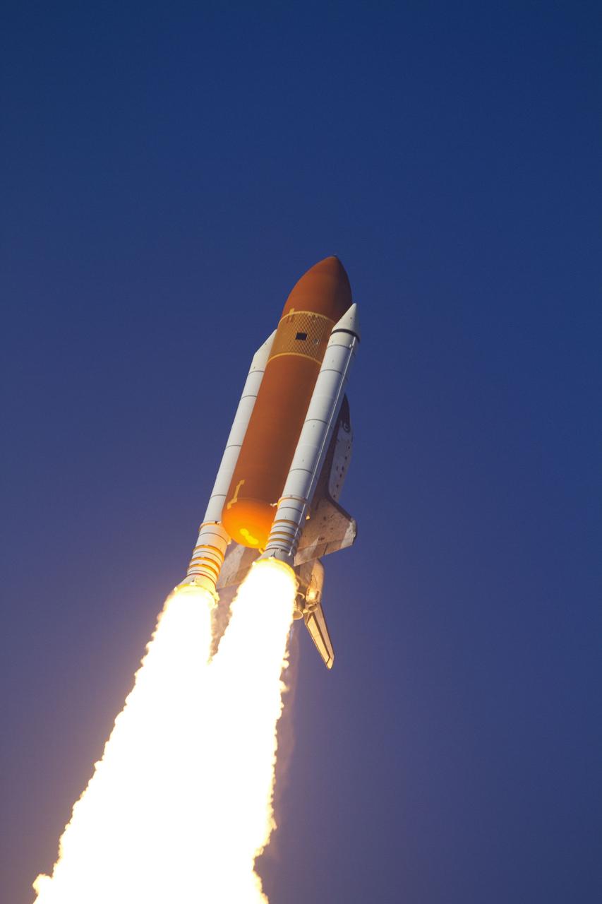 CAPE CANAVERAL, Fla. -- Space shuttle Discovery soars into orbit at 17,500 miles per hour atop twin columns of fire, embarking on its final scheduled mission, STS-133, to the International Space Station. Liftoff from launch Pad 39A at NASA's Kennedy Space Center in Florida occurred at 4:53 p.m. EST on Feb. 24.        Discovery and its six-member crew are on a mission to deliver the Permanent Multipurpose Module, packed with supplies and critical spare parts, as well as Robonaut 2, the dexterous humanoid astronaut helper, to the International Space Station. Discovery is making its 39th mission and is scheduled to be retired following STS-133. This is the 133rd Space Shuttle Program mission, the 35th shuttle voyage to the space station and Discovery's final mission. For more information on the STS-133 mission, visit www.nasa.gov/mission_pages/shuttle/shuttlemissions/sts133/. Photo credit: NASA/Kenny Allen