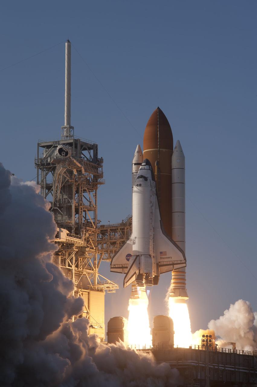 CAPE CANAVERAL, Fla. -- Space shuttle Discovery lifts off Launch Pad 39A in a billowing swirl of smoke and steam at NASA's Kennedy Space Center in Florida to begin its final flight to the International Space Station on the STS-133 mission. Launch was at 4:53 p.m. EST.    Discovery and its six-member crew will deliver the Permanent Multipurpose Module, packed with supplies and critical spare parts, as well as Robonaut 2, the dexterous humanoid astronaut helper, to the orbiting outpost. Discovery is flying on its 39th mission and is scheduled to be retired following STS-133. This is the 133rd Space Shuttle Program mission and the 35th shuttle voyage to the space station. For more information on the STS-133 mission, visit www.nasa.gov/mission_pages/shuttle/shuttlemissions/sts133/. Photo credit: NASA/Sandra Joseph and Kevin O'Connell