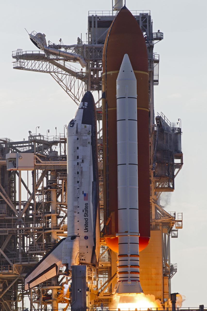 CAPE CANAVERAL, Fla. -- Space shuttle Discovery ignites for liftoff from Launch Pad 39A at NASA's Kennedy Space Center in Florida, beginning its final flight, the STS-133 mission, to the International Space Station. Launch was at 4:53 p.m. EST.          Discovery and its six-member crew will deliver the Permanent Multipurpose Module, packed with supplies and critical spare parts, as well as Robonaut 2, the dexterous humanoid astronaut helper, to the orbiting outpost. Discovery is flying on its 39th mission and is scheduled to be retired following STS-133. This is the 133rd Space Shuttle Program mission and the 35th shuttle voyage to the space station. For more information on the STS-133 mission, visit www.nasa.gov/mission_pages/shuttle/shuttlemissions/sts133/. Photo credit: NASA/Rusty Backer and Michael Gayle
