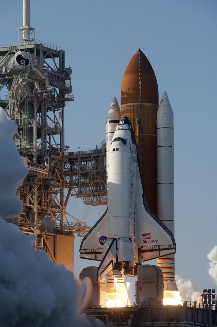 CAPE CANAVERAL, Fla. -- Space shuttle Discovery ignites for liftoff from Launch Pad 39A at NASA's Kennedy Space Center in Florida, beginning its final flight, the STS-133 mission. Launch to the International Space Station was at 4:53 p.m. EST.      Discovery and its six-member crew will deliver the Permanent Multipurpose Module, packed with supplies and critical spare parts, as well as Robonaut 2, the dexterous humanoid astronaut helper, to the orbiting outpost. Discovery is flying on its 39th mission and is scheduled to be retired following STS-133. This is the 133rd Space Shuttle Program mission and the 35th shuttle voyage to the space station. For more information on the STS-133 mission, visit www.nasa.gov/mission_pages/shuttle/shuttlemissions/sts133/. Photo credit: NASA/Sandra Joseph and Kevin O'Connell