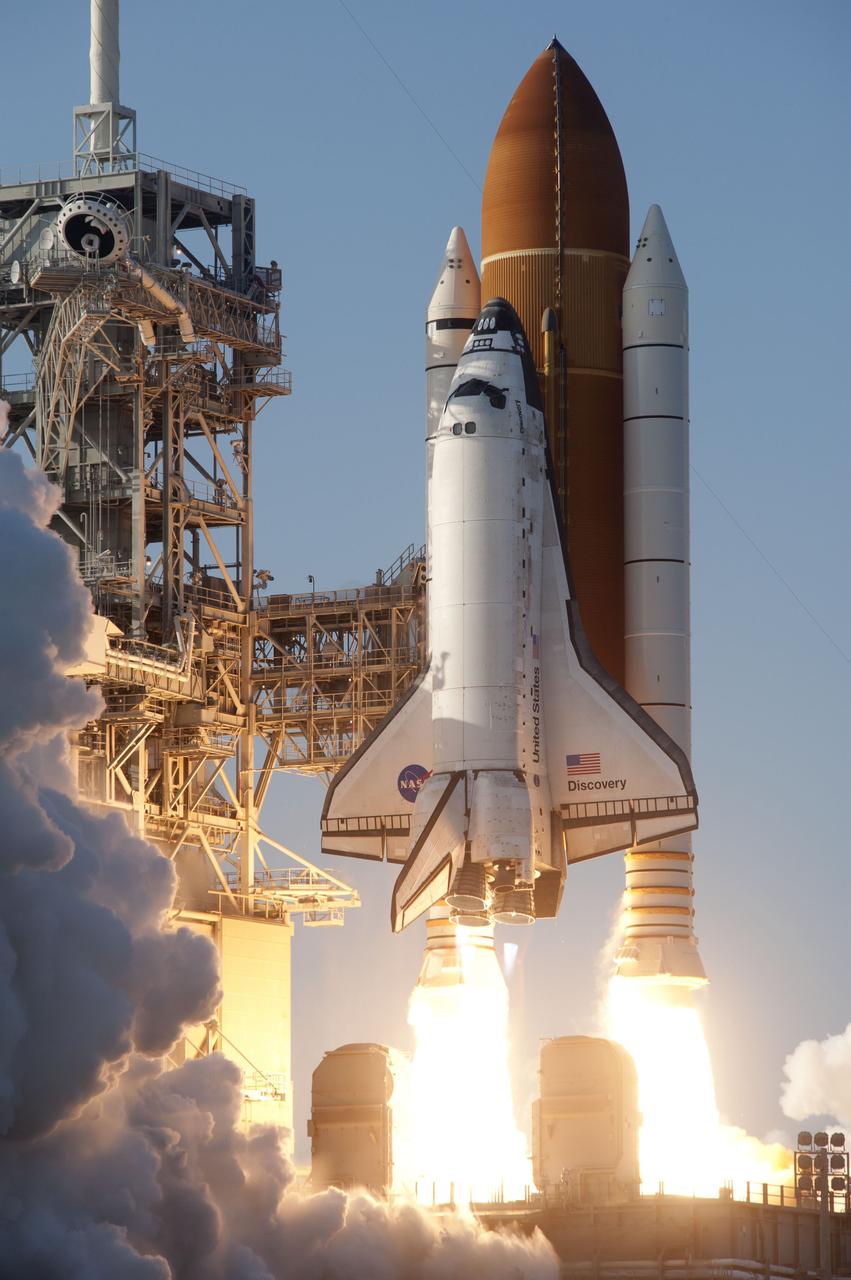 CAPE CANAVERAL, Fla. -- Space shuttle Discovery ignites for liftoff from Launch Pad 39A at NASA's Kennedy Space Center in Florida, beginning its final flight, the STS-133 mission. Launch to the International Space Station was at 4:53 p.m. EST.      Discovery and its six-member crew will deliver the Permanent Multipurpose Module, packed with supplies and critical spare parts, as well as Robonaut 2, the dexterous humanoid astronaut helper, to the orbiting outpost. Discovery is flying on its 39th mission and is scheduled to be retired following STS-133. This is the 133rd Space Shuttle Program mission and the 35th shuttle voyage to the space station. For more information on the STS-133 mission, visit www.nasa.gov/mission_pages/shuttle/shuttlemissions/sts133/. Photo credit: NASA/Sandra Joseph and Kevin O'Connell