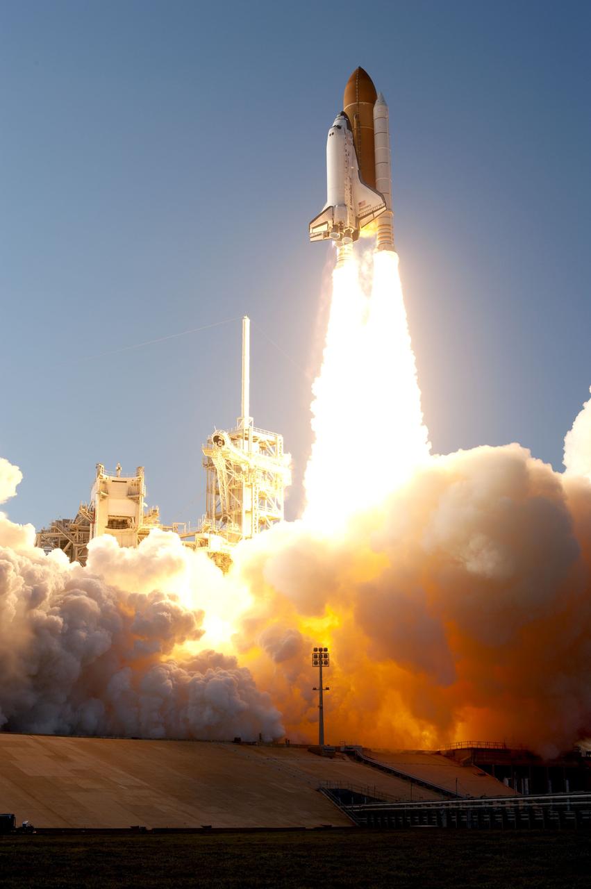 CAPE CANAVERAL, Fla. -- Space shuttle Discovery lifts off from Launch Pad 39A and clears the tower at NASA's Kennedy Space Center in Florida, beginning its final flight, the STS-133 mission. Launch to the International Space Station was at 4:53 p.m. EST.      Discovery and its six-member crew will deliver the Permanent Multipurpose Module, packed with supplies and critical spare parts, as well as Robonaut 2, the dexterous humanoid astronaut helper, to the orbiting outpost. Discovery is flying on its 39th mission and is scheduled to be retired following STS-133. This is the 133rd Space Shuttle Program mission and the 35th shuttle voyage to the space station. For more information on the STS-133 mission, visit www.nasa.gov/mission_pages/shuttle/shuttlemissions/sts133/. Photo credit: NASA/Sandra Joseph and Kevin O'Connell