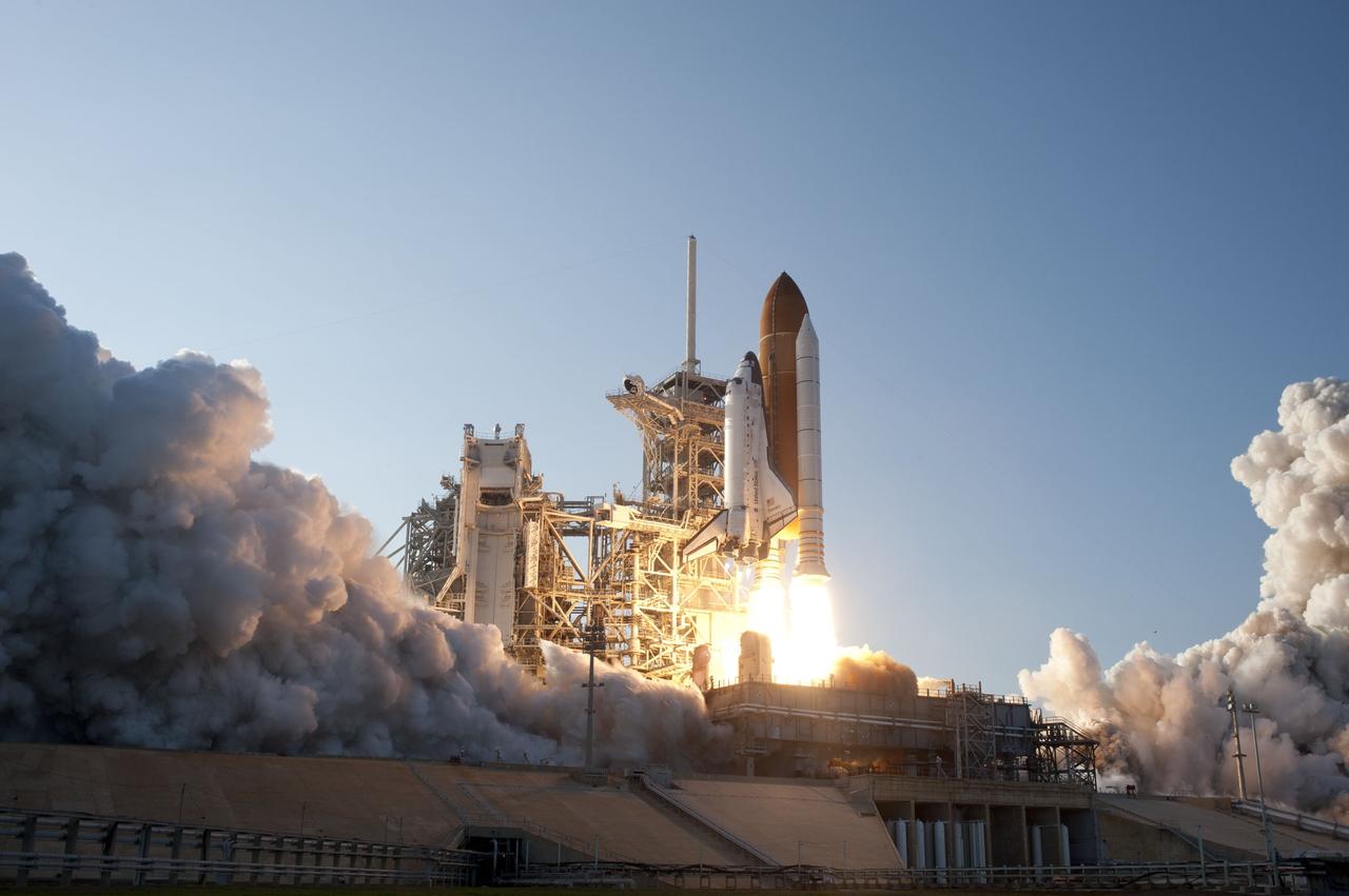 CAPE CANAVERAL, Fla. -- Space shuttle Discovery ignites for liftoff off from Launch Pad 39A at NASA's Kennedy Space Center in Florida beginning its final flight, the STS-133 mission. Launch to the International Space Station was at 4:53 p.m. EST.        Discovery and its six-member crew will deliver the Permanent Multipurpose Module, packed with supplies and critical spare parts, as well as Robonaut 2, the dexterous humanoid astronaut helper, to the orbiting outpost. Discovery is flying on its 39th mission and is scheduled to be retired following STS-133. This is the 133rd Space Shuttle Program mission and the 35th shuttle voyage to the space station. For more information on the STS-133 mission, visit www.nasa.gov/mission_pages/shuttle/shuttlemissions/sts133/. Photo credit: NASA/Sandra Joseph and Kevin O'Connell