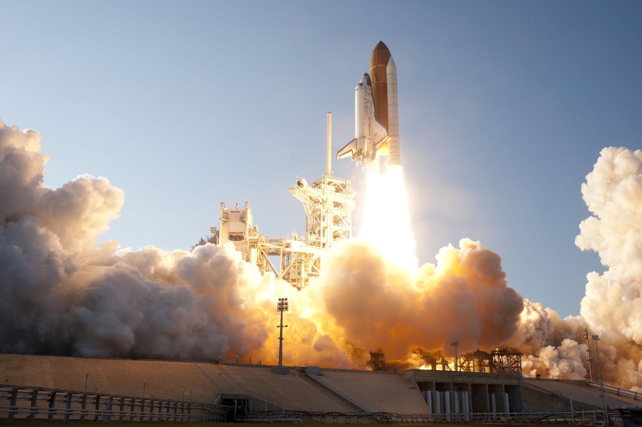 CAPE CANAVERAL, Fla. -- On twin pillars of fire, space shuttle Discovery lifts off Launch Pad 39A at NASA's Kennedy Space Center in Florida beginning its final flight, the STS-133 mission. Launch to the International Space Station was at 4:53 p.m. EST.        Discovery and its six-member crew will deliver the Permanent Multipurpose Module, packed with supplies and critical spare parts, as well as Robonaut 2, the dexterous humanoid astronaut helper, to the orbiting outpost. Discovery is flying on its 39th mission and is scheduled to be retired following STS-133. This is the 133rd Space Shuttle Program mission and the 35th shuttle voyage to the space station. For more information on the STS-133 mission, visit www.nasa.gov/mission_pages/shuttle/shuttlemissions/sts133/. Photo credit: NASA/Sandra Joseph and Kevin O'Connell