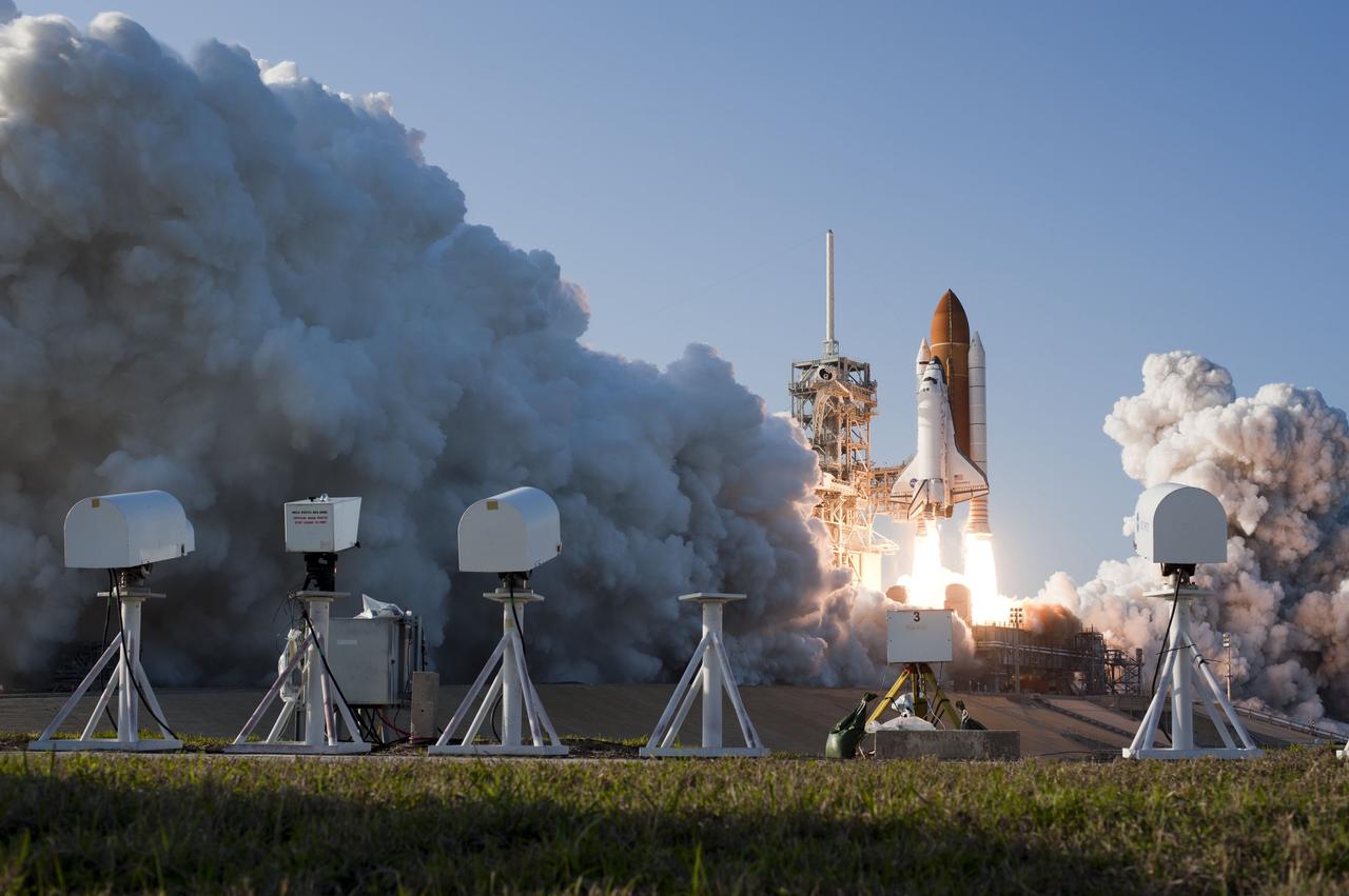 CAPE CANAVERAL, Fla. -- Cameras stationed near Launch Pad 39A capture space shuttle Discovery as it lifts off from NASA's Kennedy Space Center in Florida beginning its final flight, the STS-133, mission to the International Space Station. Launch was at 4:53 p.m. EST.        Discovery and its six-member crew will deliver the Permanent Multipurpose Module, packed with supplies and critical spare parts, as well as Robonaut 2, the dexterous humanoid astronaut helper, to the orbiting outpost. Discovery is flying on its 39th mission and is scheduled to be retired following STS-133. This is the 133rd Space Shuttle Program mission and the 35th shuttle voyage to the space station. For more information on the STS-133 mission, visit www.nasa.gov/mission_pages/shuttle/shuttlemissions/sts133/. Photo credit: NASA/Tony Gray and Tom Farrar