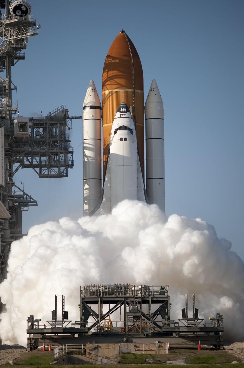 CAPE CANAVERAL, Fla. -- Smoke and steam billow around space shuttle Discovery and Launch Pad 39A at NASA's Kennedy Space Center in Florida, as the shuttle's solid rocket boosters and main engines ignite for lift off, embarking on its final flight, the STS-133 mission. Launch to the International Space Station was at 4:53 p.m. EST. Discovery and its six-member crew will deliver the Permanent Multipurpose Module, packed with supplies and critical spare parts, as well as Robonaut 2, the dexterous humanoid astronaut helper, to the orbiting outpost. Discovery is flying on its 39th mission and is scheduled to be retired following STS-133. This is the 133rd Space Shuttle Program mission and the 35th shuttle voyage to the space station. For more information on the STS-133 mission, visit www.nasa.gov/mission_pages/shuttle/shuttlemissions/sts133/. Photo credit: NASA/Tony Gray and Tom Farrar