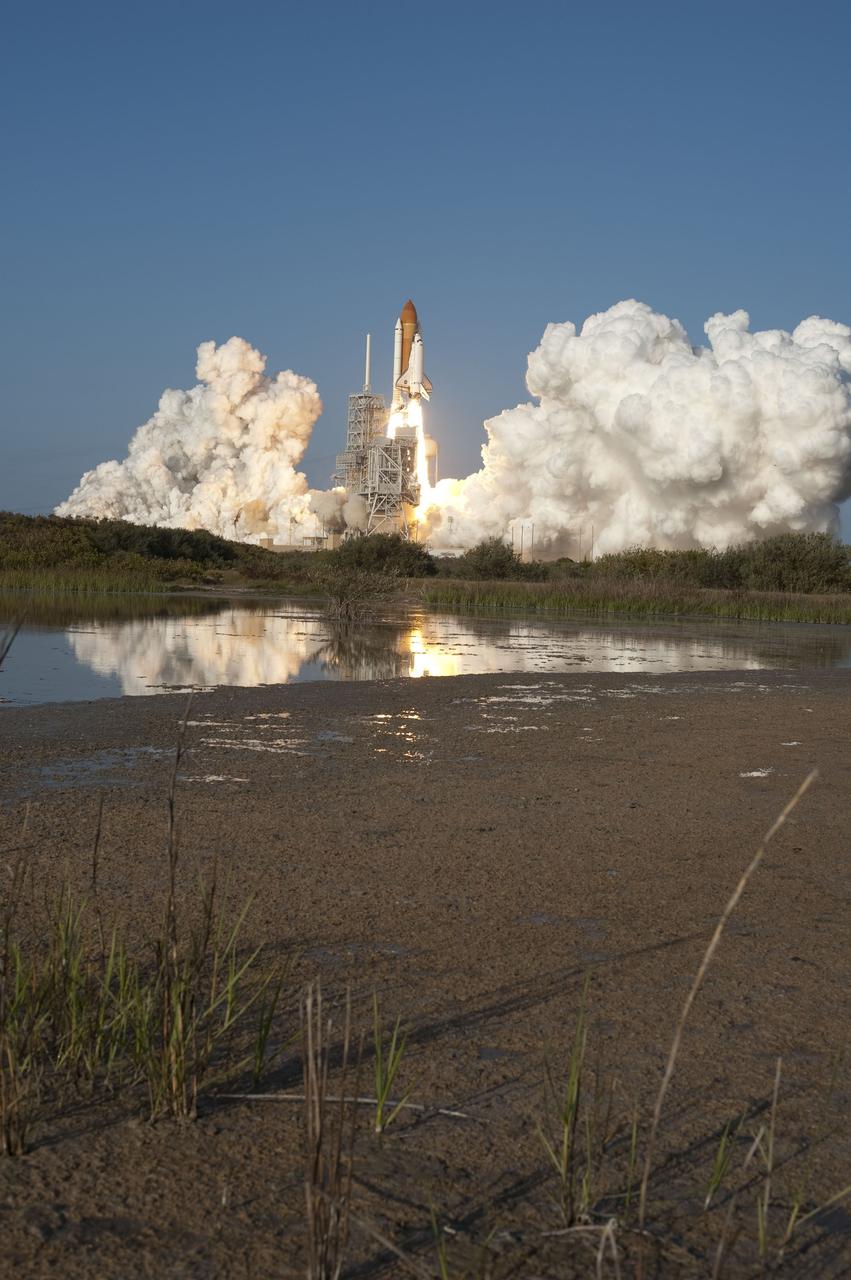 CAPE CANAVERAL, Fla. -- Space shuttle Discovery ignites for liftoff from Launch Pad 39A at NASA's Kennedy Space Center in Florida, beginning its final flight, the STS-133 mission, to the International Space Station. Launch was at 4:53 p.m. EST.      Discovery and its six-member crew will deliver the Permanent Multipurpose Module, packed with supplies and critical spare parts, as well as Robonaut 2, the dexterous humanoid astronaut helper, to the orbiting outpost. Discovery is flying on its 39th mission and is scheduled to be retired following STS-133. This is the 133rd Space Shuttle Program mission and the 35th shuttle voyage to the space station. For more information on the STS-133 mission, visit www.nasa.gov/mission_pages/shuttle/shuttlemissions/sts133/. Photo credit: NASA/Tony Gray and Tom Farrar