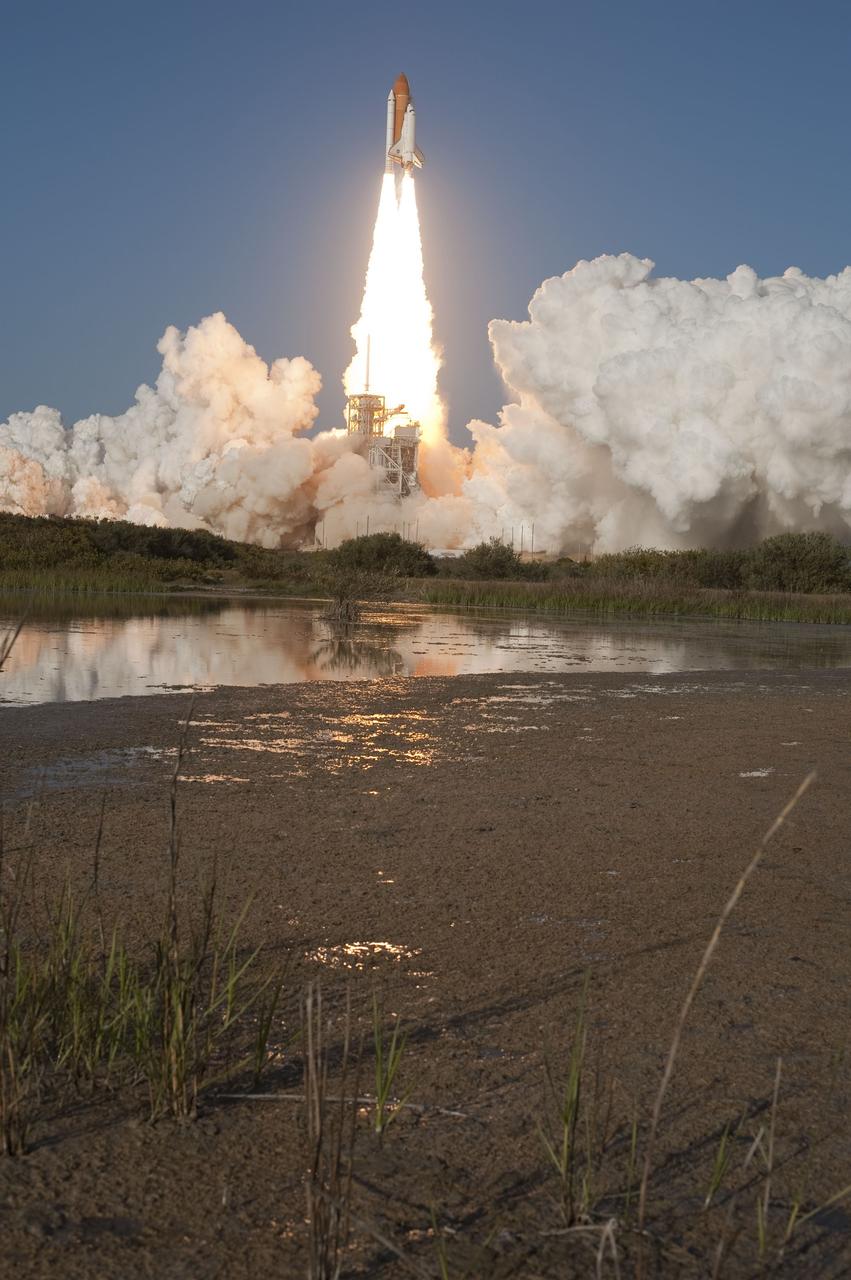 CAPE CANAVERAL, Fla. -- Smoke and steam billow around Launch Pad 39A at NASA's Kennedy Space Center in Florida, after space shuttle Discovery's engines ignited for lift off,  embarking on its final flight, the STS-133 mission, to the International Space Station. Launch was at 4:53 p.m. EST.    Discovery and its six-member crew will deliver the Permanent Multipurpose Module, packed with supplies and critical spare parts, as well as Robonaut 2, the dexterous humanoid astronaut helper, to the orbiting outpost. Discovery is flying on its 39th mission and is scheduled to be retired following STS-133. This is the 133rd Space Shuttle Program mission and the 35th shuttle voyage to the space station. For more information on the STS-133 mission, visit www.nasa.gov/mission_pages/shuttle/shuttlemissions/sts133/. Photo credit: NASA/Tony Gray and Tom Farrar