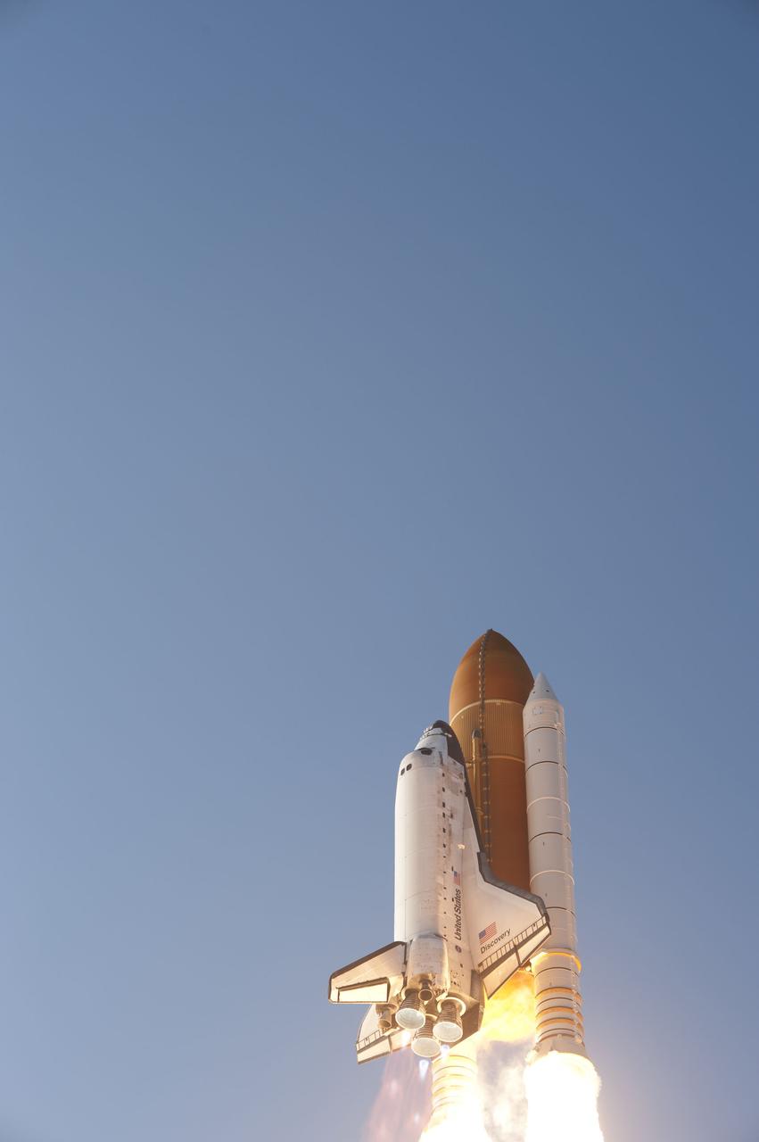CAPE CANAVERAL, Fla. -- Space shuttle Discovery heads to space after lifting off from Launch Pad 39A at NASA's Kennedy Space Center in Florida to begin its final flight, the STS-133 mission, to the International Space Station. Launch was at 4:53 p.m. EST.        Discovery and its six-member crew will deliver the Permanent Multipurpose Module, packed with supplies and critical spare parts, as well as Robonaut 2, the dexterous humanoid astronaut helper, to the orbiting outpost. Discovery is flying on its 39th mission and is scheduled to be retired following STS-133. This is the 133rd Space Shuttle Program mission and the 35th shuttle voyage to the space station. For more information on the STS-133 mission, visit www.nasa.gov/mission_pages/shuttle/shuttlemissions/sts133/. Photo credit: NASA/Tony Gray and Tom Farrar