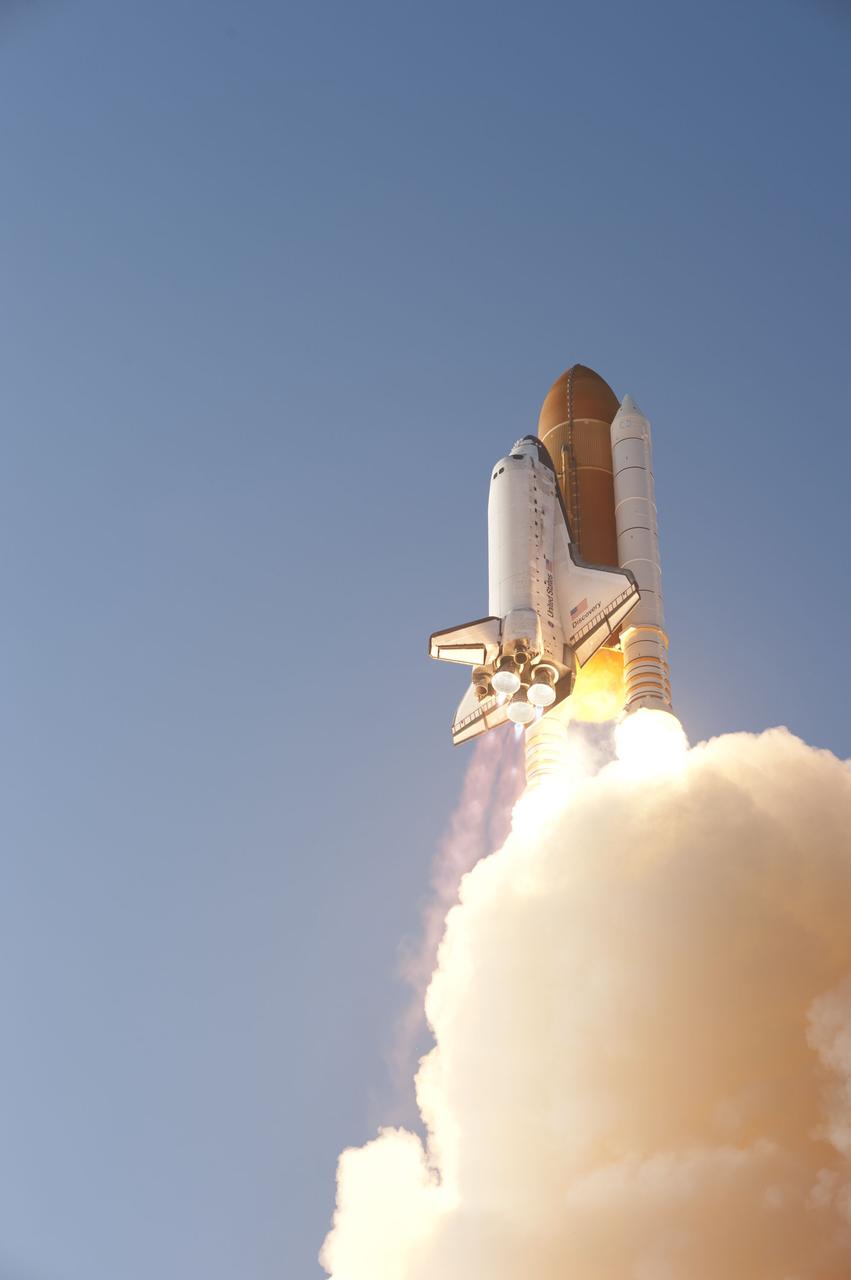 CAPE CANAVERAL, Fla. -- Space shuttle Discovery heads to space after lifting off from Launch Pad 39A at NASA's Kennedy Space Center in Florida to begin its final flight, the STS-133 mission, to the International Space Station. Launch was at 4:53 p.m. EST.        Discovery and its six-member crew will deliver the Permanent Multipurpose Module, packed with supplies and critical spare parts, as well as Robonaut 2, the dexterous humanoid astronaut helper, to the orbiting outpost. Discovery is flying on its 39th mission and is scheduled to be retired following STS-133. This is the 133rd Space Shuttle Program mission and the 35th shuttle voyage to the space station. For more information on the STS-133 mission, visit www.nasa.gov/mission_pages/shuttle/shuttlemissions/sts133/. Photo credit: NASA/Tony Gray and Tom Farrar