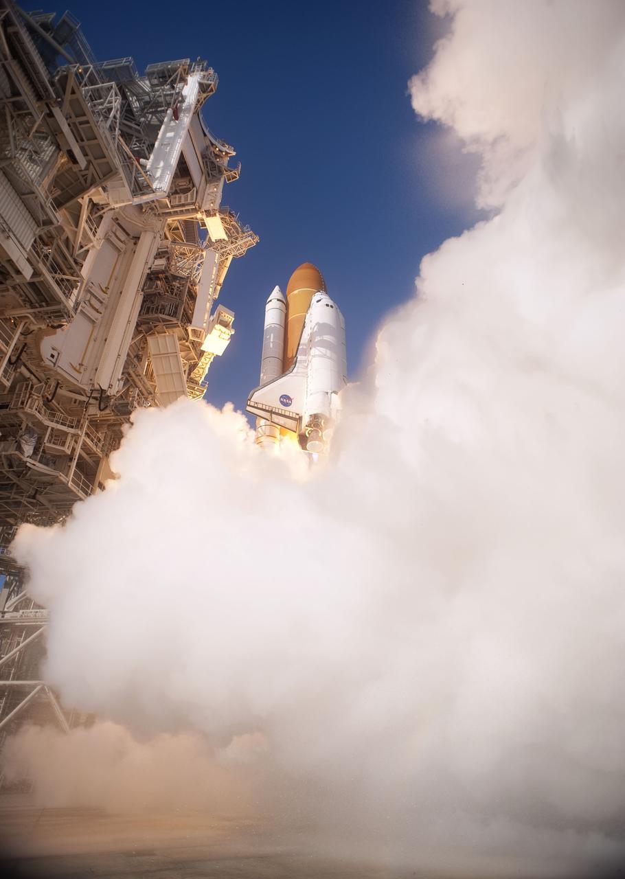CAPE CANAVERAL, Fla. -- Enveloped in smoke and steam, space shuttle Discovery lifts off from Launch Pad 39A at NASA's Kennedy Space Center in Florida beginning its final flight, the STS-133 mission, to the International Space Station. Launch was at 4:53 p.m. EST.          Discovery and its six-member crew will deliver the Permanent Multipurpose Module, packed with supplies and critical spare parts, as well as Robonaut 2, the dexterous humanoid astronaut helper, to the orbiting outpost. Discovery is flying on its 39th mission and is scheduled to be retired following STS-133. This is the 133rd Space Shuttle Program mission and the 35th shuttle voyage to the space station. For more information on the STS-133 mission, visit www.nasa.gov/mission_pages/shuttle/shuttlemissions/sts133/. Photo credit: NASA/Tony Gray and Tom Farrar