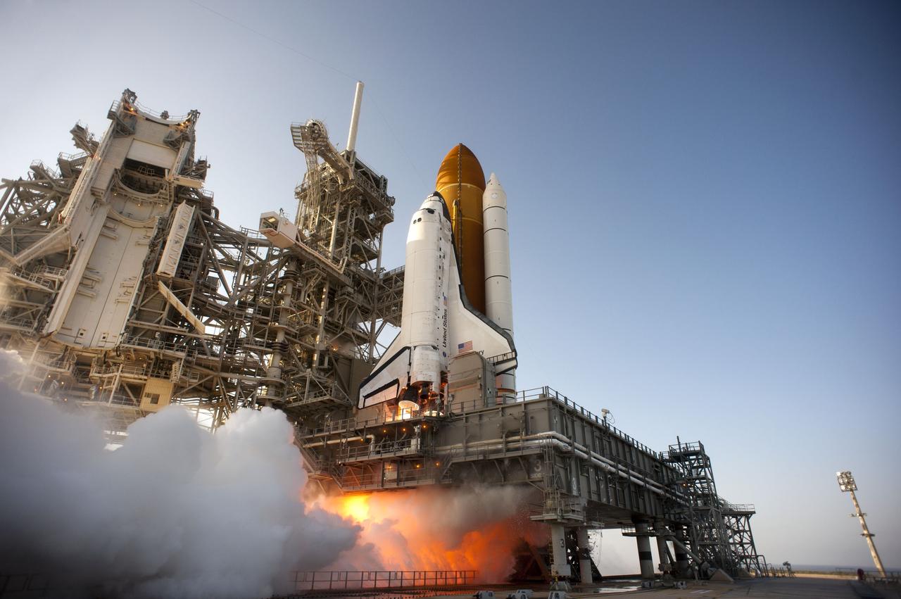 CAPE CANAVERAL, Fla. -- Space shuttle Discovery ignites for liftoff on Launch Pad 39A at NASA's Kennedy Space Center in Florida beginning its final flight, the STS-133 mission, to the International Space Station. Launch was at 4:53 p.m. EST.    Discovery and its six-member crew will deliver the Permanent Multipurpose Module, packed with supplies and critical spare parts, as well as Robonaut 2, the dexterous humanoid astronaut helper, to the orbiting outpost. Discovery is flying on its 39th mission and is scheduled to be retired following STS-133. This is the 133rd Space Shuttle Program mission and the 35th shuttle voyage to the space station. For more information on the STS-133 mission, visit www.nasa.gov/mission_pages/shuttle/shuttlemissions/sts133/. Photo credit: NASA/Tony Gray and Tom Farrar