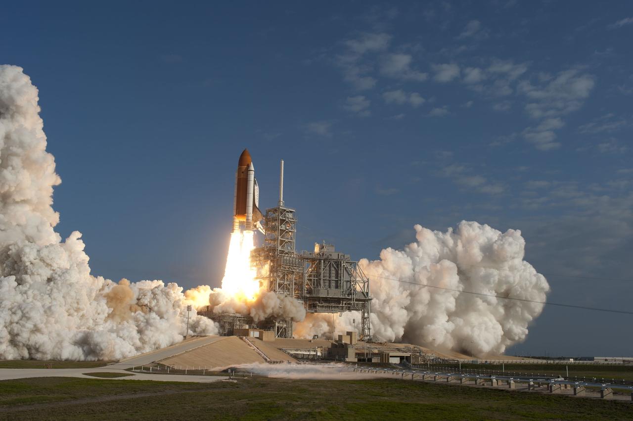 CAPE CANAVERAL, Fla. -- Leaving behind clouds of smoke and steam, space shuttle Discovery lifts off from Launch Pad 39A at NASA's Kennedy Space Center in Florida beginning its final flight, the STS-133 mission, to the International Space Station. Launch was at 4:53 p.m. EST.            Discovery and its six-member crew will deliver the Permanent Multipurpose Module, packed with supplies and critical spare parts, as well as Robonaut 2, the dexterous humanoid astronaut helper, to the orbiting outpost. Discovery is flying on its 39th mission and is scheduled to be retired following STS-133. This is the 133rd Space Shuttle Program mission and the 35th shuttle voyage to the space station. For more information on the STS-133 mission, visit www.nasa.gov/mission_pages/shuttle/shuttlemissions/sts133/. Photo credit: NASA/Sandra Joseph and Kevin O'Connell