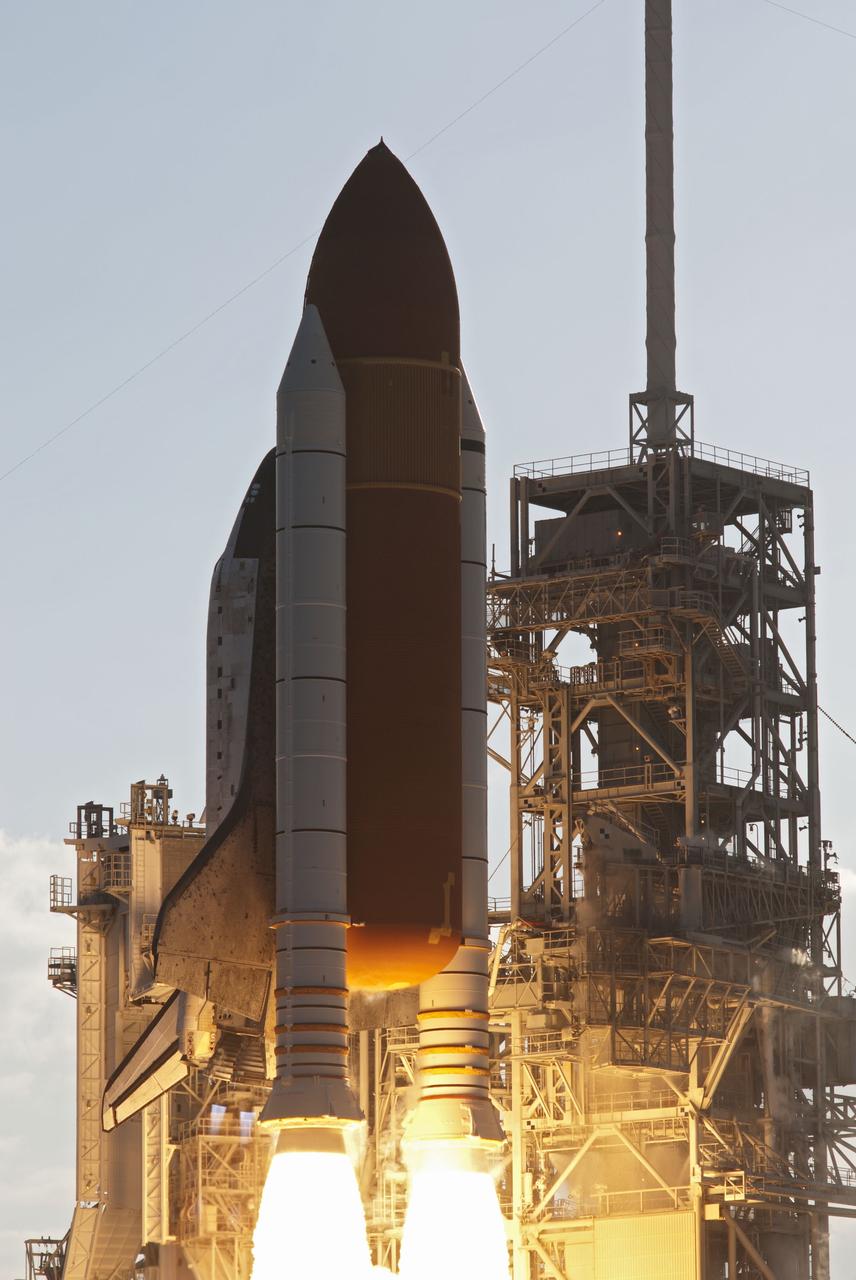 CAPE CANAVERAL, Fla. -- On  twin columns of fire, space shuttle Discovery's solid rocket boosters ignite for liftoff on Launch Pad 39A at NASA's Kennedy Space Center in Florida. Discovery's final launch, the STS-133 mission, to the International Space was at 4:53 p.m. EST.      Discovery and its six-member crew will deliver the Permanent Multipurpose Module, packed with supplies and critical spare parts, as well as Robonaut 2, the dexterous humanoid astronaut helper, to the orbiting outpost. Discovery is flying on its 39th mission and is scheduled to be retired following STS-133. This is the 133rd Space Shuttle Program mission and the 35th shuttle voyage to the space station. For more information on the STS-133 mission, visit www.nasa.gov/mission_pages/shuttle/shuttlemissions/sts133/. Photo credit: NASA/Rusty Backer and Michael Gayle