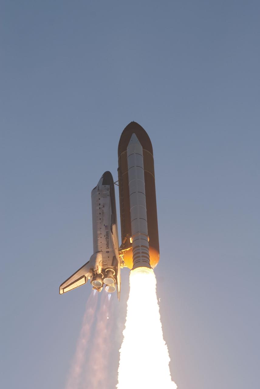 CAPE CANAVERAL, Fla. -- Space shuttle Discovery soars toward orbit hour atop twin columns of fire, beginning its final flight, the STS-133 mission, to the International Space Station. The shuttle lifted off from Launch Pad 39A at NASA's Kennedy Space Center in Florida at 4:53 p.m. EST.    Discovery and its six-member crew will deliver the Permanent Multipurpose Module, packed with supplies and critical spare parts, as well as Robonaut 2, the dexterous humanoid astronaut helper, to the orbiting outpost. Discovery is flying on its 39th mission and is scheduled to be retired following STS-133. This is the 133rd Space Shuttle Program mission and the 35th shuttle voyage to the space station. For more information on the STS-133 mission, visit www.nasa.gov/mission_pages/shuttle/shuttlemissions/sts133/. Photo credit: NASA/Rusty Backer and Michael Gayle