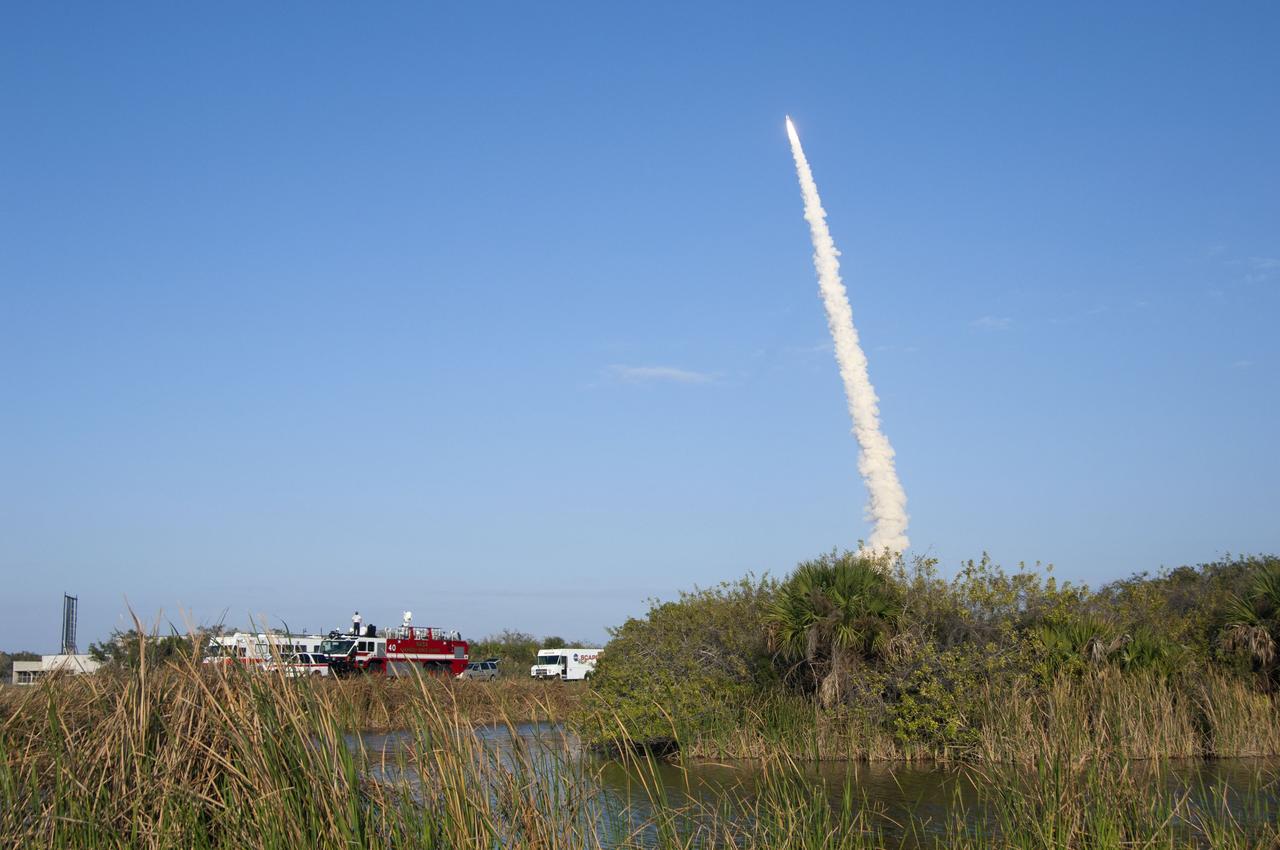 CAPE CANAVERAL, Fla. -- Space shuttle Discovery soars toward space after liftoff from Launch Pad 39A at NASA's Kennedy Space Center in Florida beginning its final flight,  the STS-133 mission, to the International Space Station. Launch was at 4:53 p.m. EST.          Discovery and its six-member crew will deliver the Permanent Multipurpose Module, packed with supplies and critical spare parts, as well as Robonaut 2, the dexterous humanoid astronaut helper, to the orbiting outpost. Discovery is flying on its 39th mission and is scheduled to be retired following STS-133. This is the 133rd Space Shuttle Program mission and the 35th shuttle voyage to the space station. For more information on the STS-133 mission, visit www.nasa.gov/mission_pages/shuttle/shuttlemissions/sts133/. Photo credit: NASA/Linda Perry