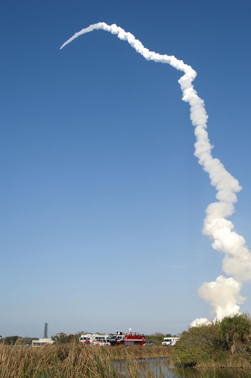 CAPE CANAVERAL, Fla. -- Space shuttle Discovery soars toward space after liftoff from Launch Pad 39A at NASA's Kennedy Space Center in Florida beginning its final flight,  the STS-133 mission, to the International Space Station. Launch was at 4:53 p.m. EST.          Discovery and its six-member crew will deliver the Permanent Multipurpose Module, packed with supplies and critical spare parts, as well as Robonaut 2, the dexterous humanoid astronaut helper, to the orbiting outpost. Discovery is flying on its 39th mission and is scheduled to be retired following STS-133. This is the 133rd Space Shuttle Program mission and the 35th shuttle voyage to the space station. For more information on the STS-133 mission, visit www.nasa.gov/mission_pages/shuttle/shuttlemissions/sts133/. Photo credit: NASA/Linda Perry