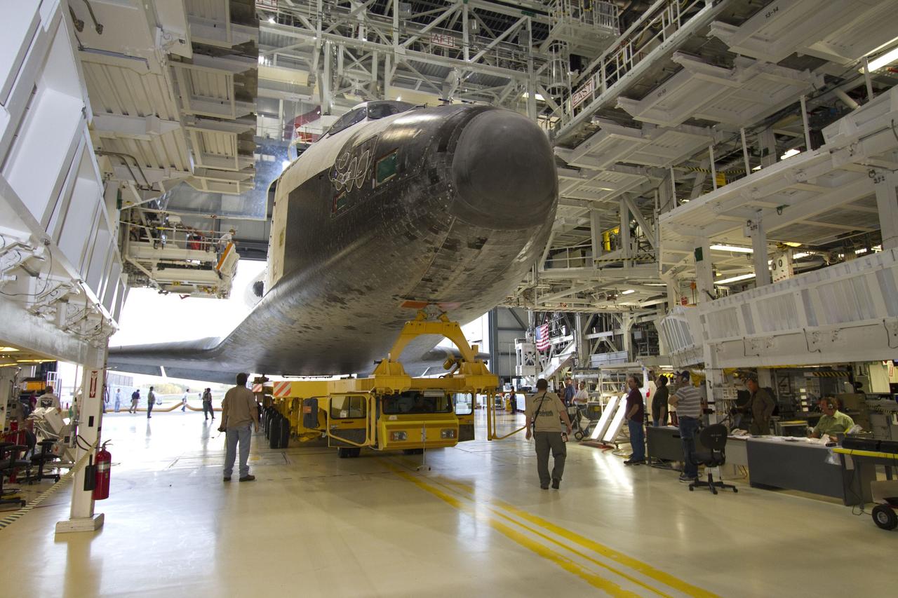 CAPE CANAVERAL, Fla. -- In Orbiter Processing Facility-2 at NASA’s Kennedy Space Center in Florida, workers prepare space shuttle Endeavour for its move, or "rollover," from its hangar to the Vehicle Assembly Building. Endeavour and its STS-134 crew will deliver the Express Logistics Carrier-3, Alpha Magnetic Spectrometer, spare parts, a high-pressure gas tank, additional spare parts for Dextre and micrometeoroid debris shields to the International Space Station. Launch is targeted for April 19 at 7:48 p.m. EDT. For more information visit, http://www.nasa.gov/mission_pages/shuttle/shuttlemissions/sts134/index.html. Photo credit: NASA/Jack Pfaller