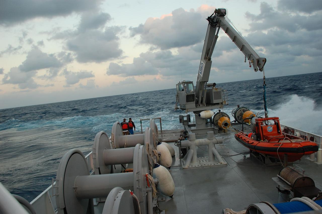 CAPE CANAVERAL, Fla. -- An expanse of ocean is seen on the horizon as Freedom Star, one of NASA's solid rocket booster retrieval ships, set sail to be in position in the Atlantic ocean to recover the spent boosters after space shuttle Discovery's STS-133 launch.              The shuttle’s two solid rocket booster casings and associated flight hardware are recovered in the Atlantic Ocean after every launch by Liberty Star and Freedom Star. The boosters impact the Atlantic about seven minutes after liftoff and the retrieval ships are stationed about 10 miles from the impact area at the time of splashdown. After the spent segments are processed, they will be transported to Utah, where they will be refurbished and stored, if needed. Photo credit: NASA/Ben Smegelsky