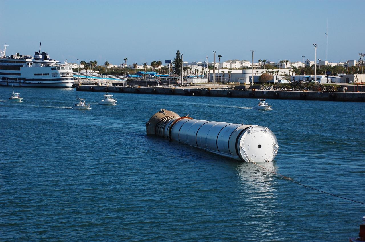 CAPE CANAVERAL, Fla. -- Freedom Star, one of NASA's solid rocket booster retrieval ships, reaches Port Canaveral, Florida with the left spent booster from space shuttle Discovery's final launch, in tow.        The shuttle’s two solid rocket booster casings and associated flight hardware are recovered in the Atlantic Ocean after every launch by Liberty Star and Freedom Star. The boosters impact the Atlantic about seven minutes after liftoff and the retrieval ships are stationed about 10 miles from the impact area at the time of splashdown. After the spent segments are processed, they will be transported to Utah, where they will be refurbished and stored, if needed. Photo credit: NASA/Ben Smegelsky